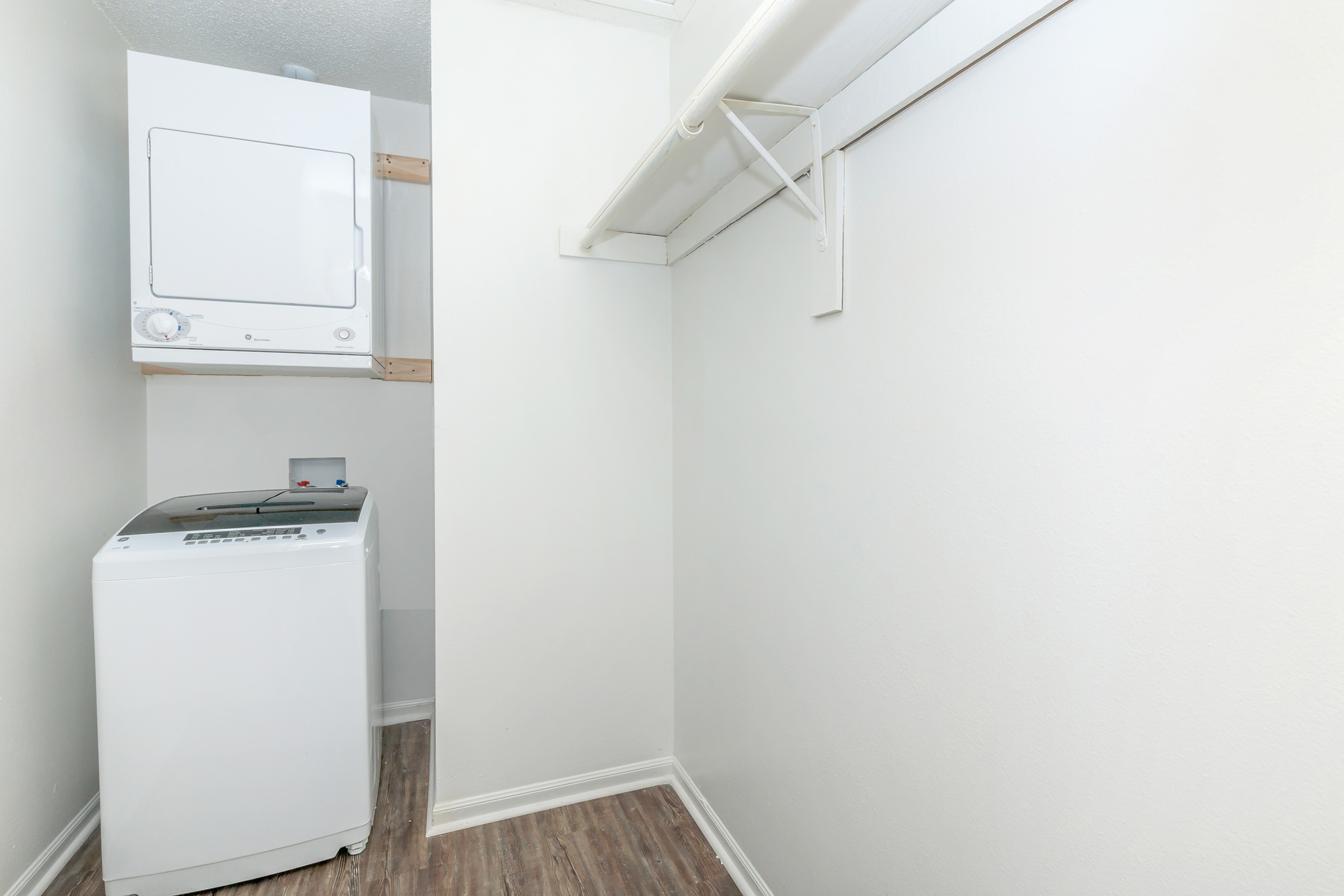 a kitchen with a sink and a refrigerator