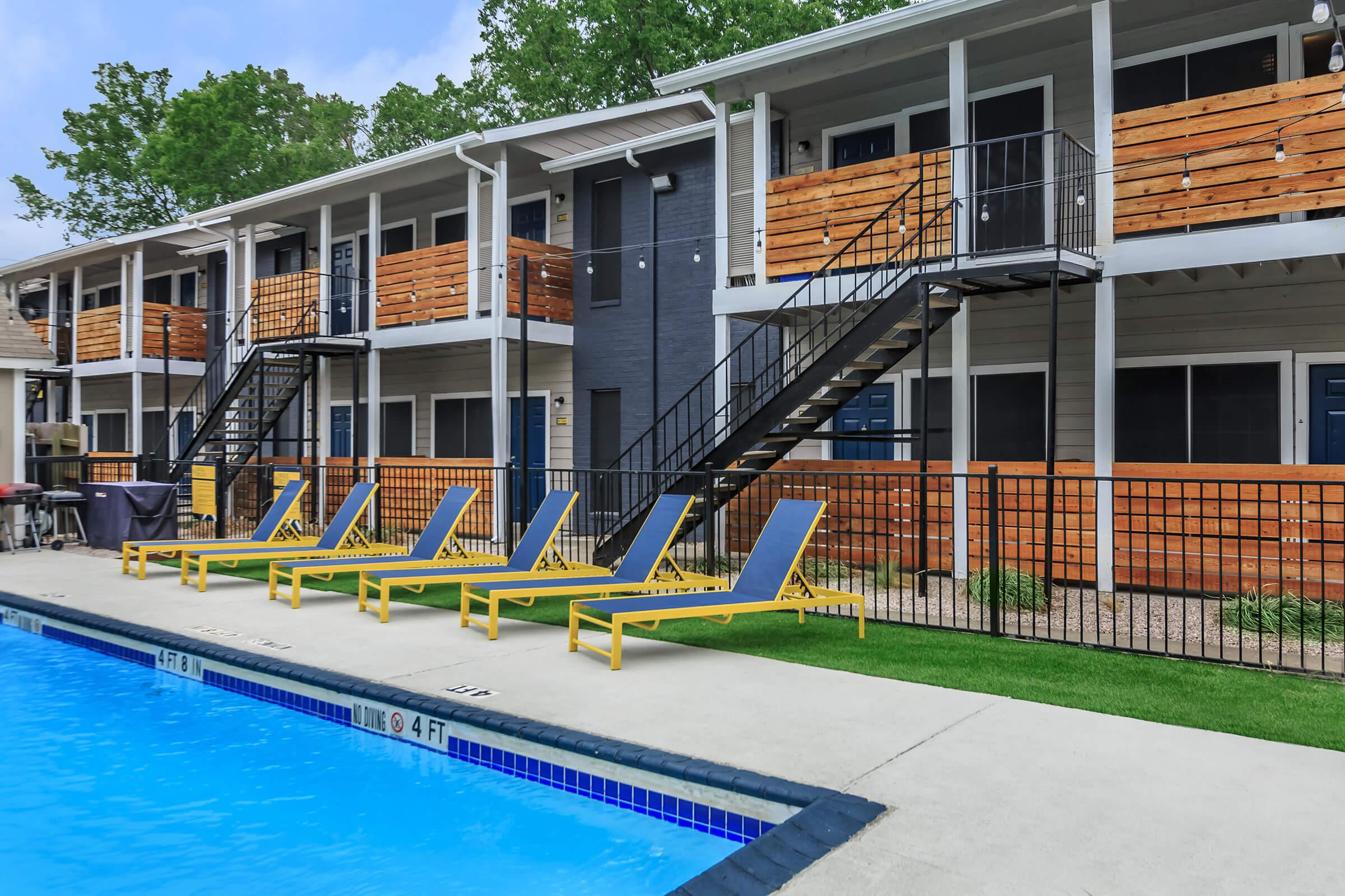 a pool in front of a building