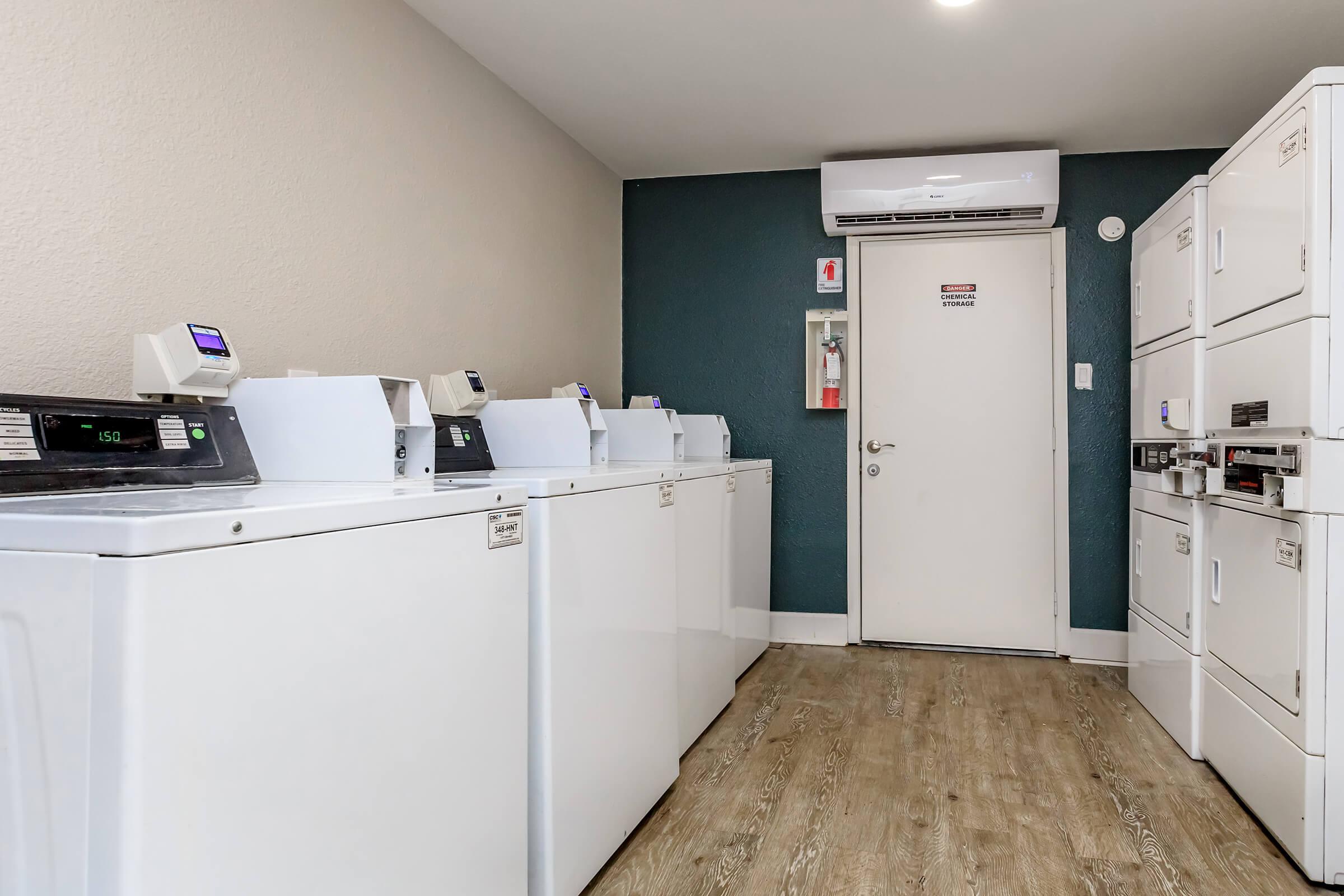 a kitchen with a sink and a refrigerator