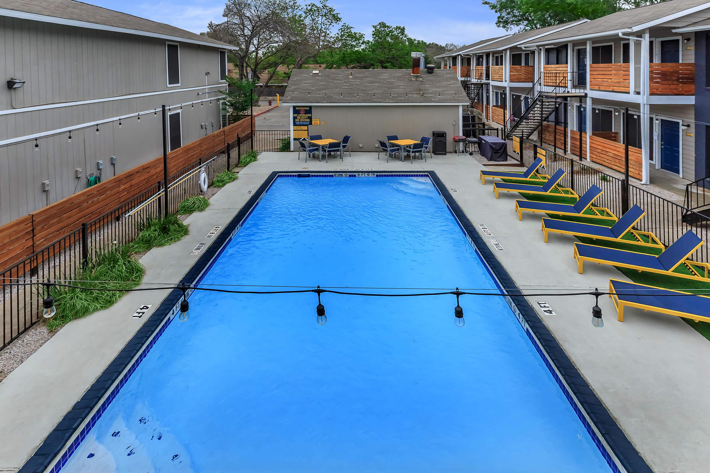 a pool next to a building