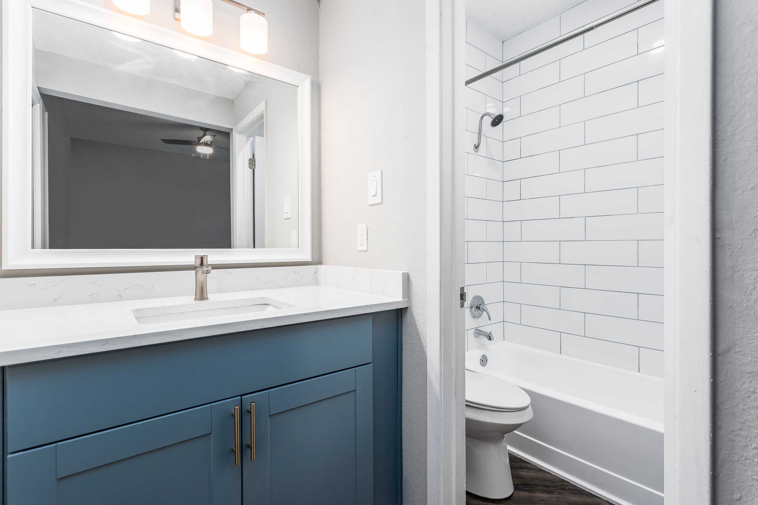 a kitchen with a sink and a window