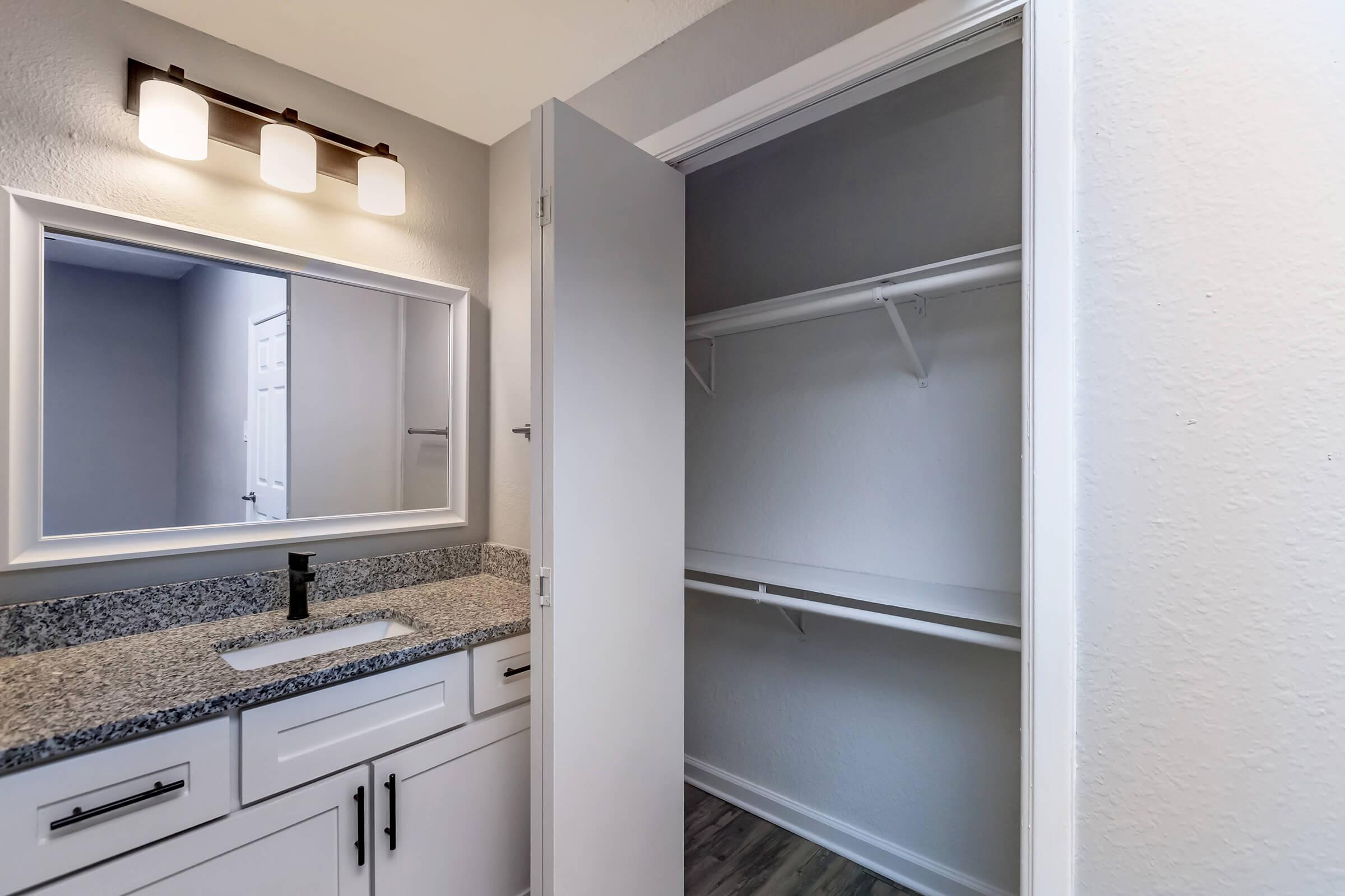 a kitchen with a sink and a refrigerator