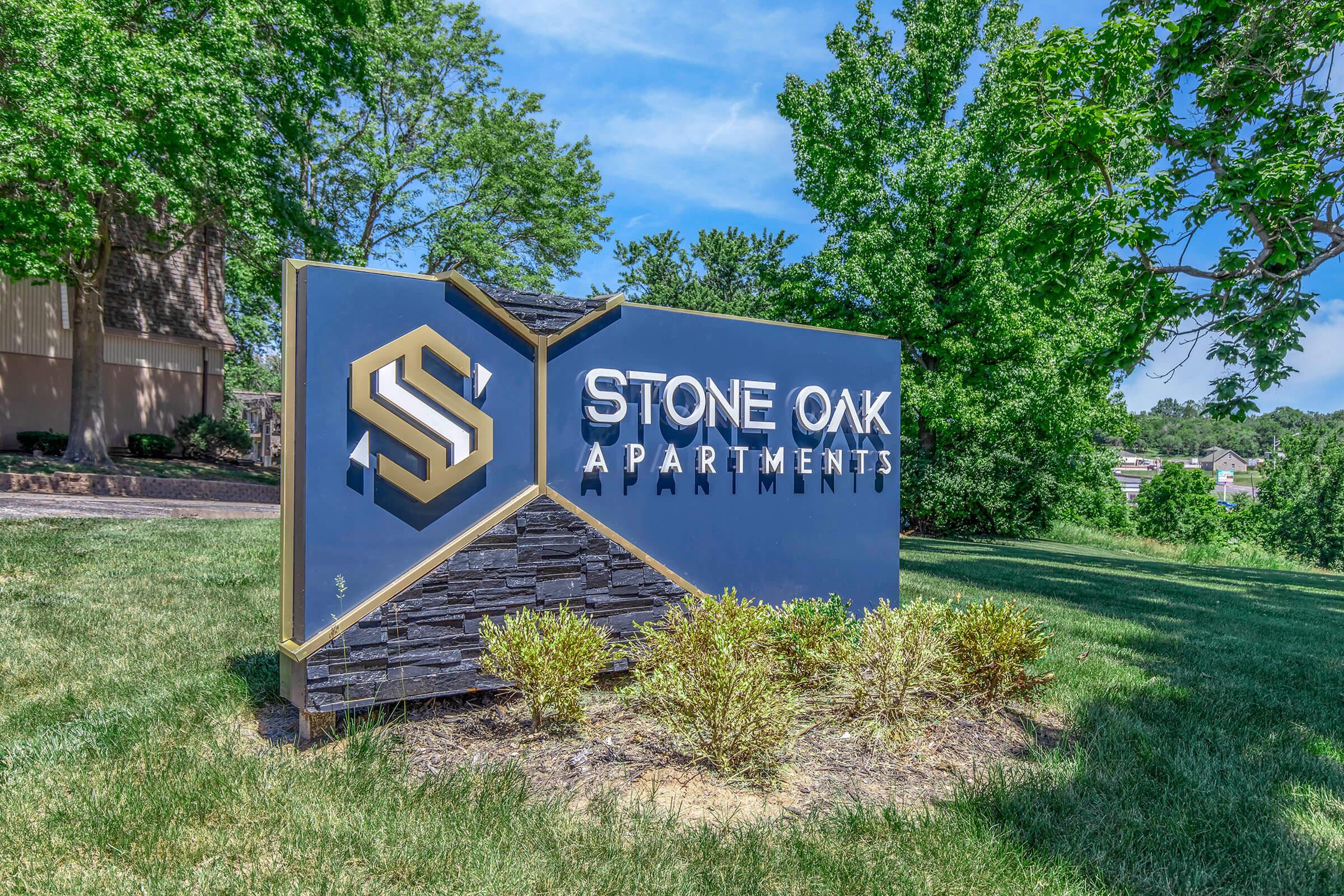 a sign in front of a house