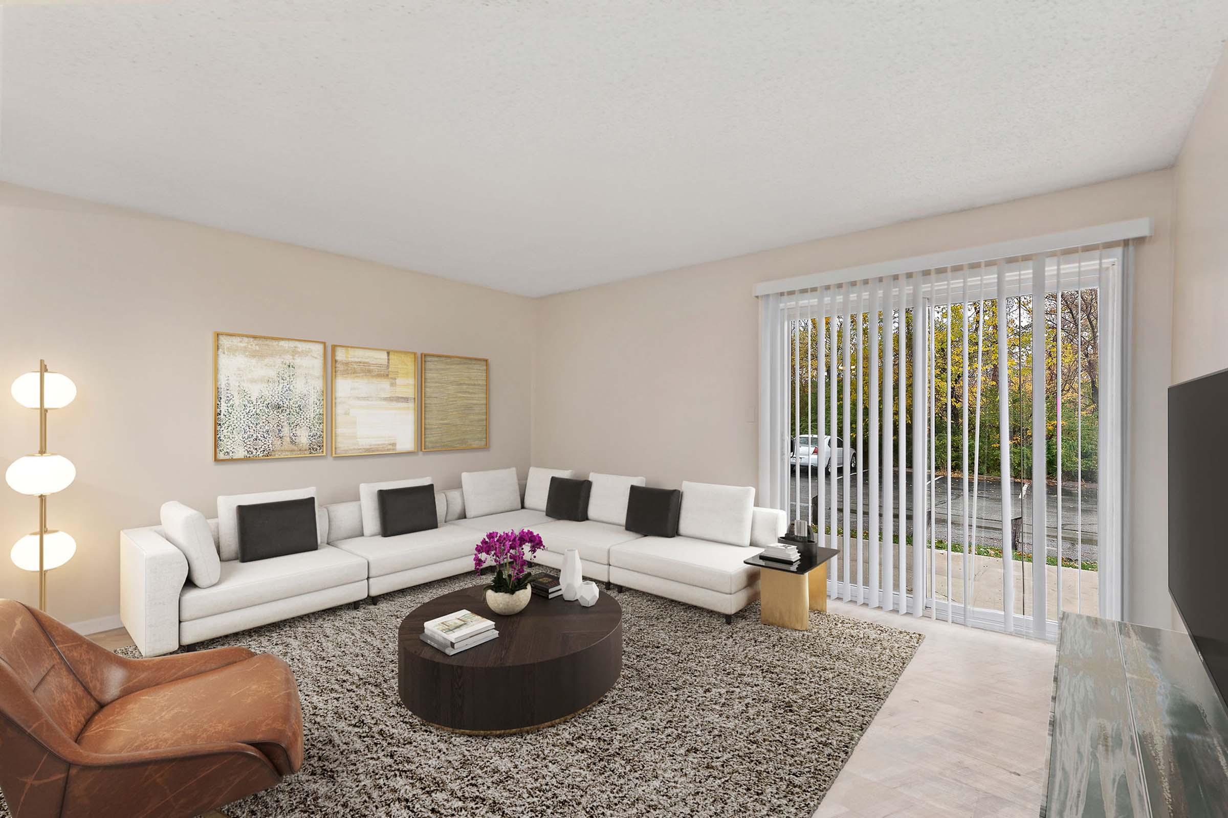 a living room filled with furniture and a flat screen tv