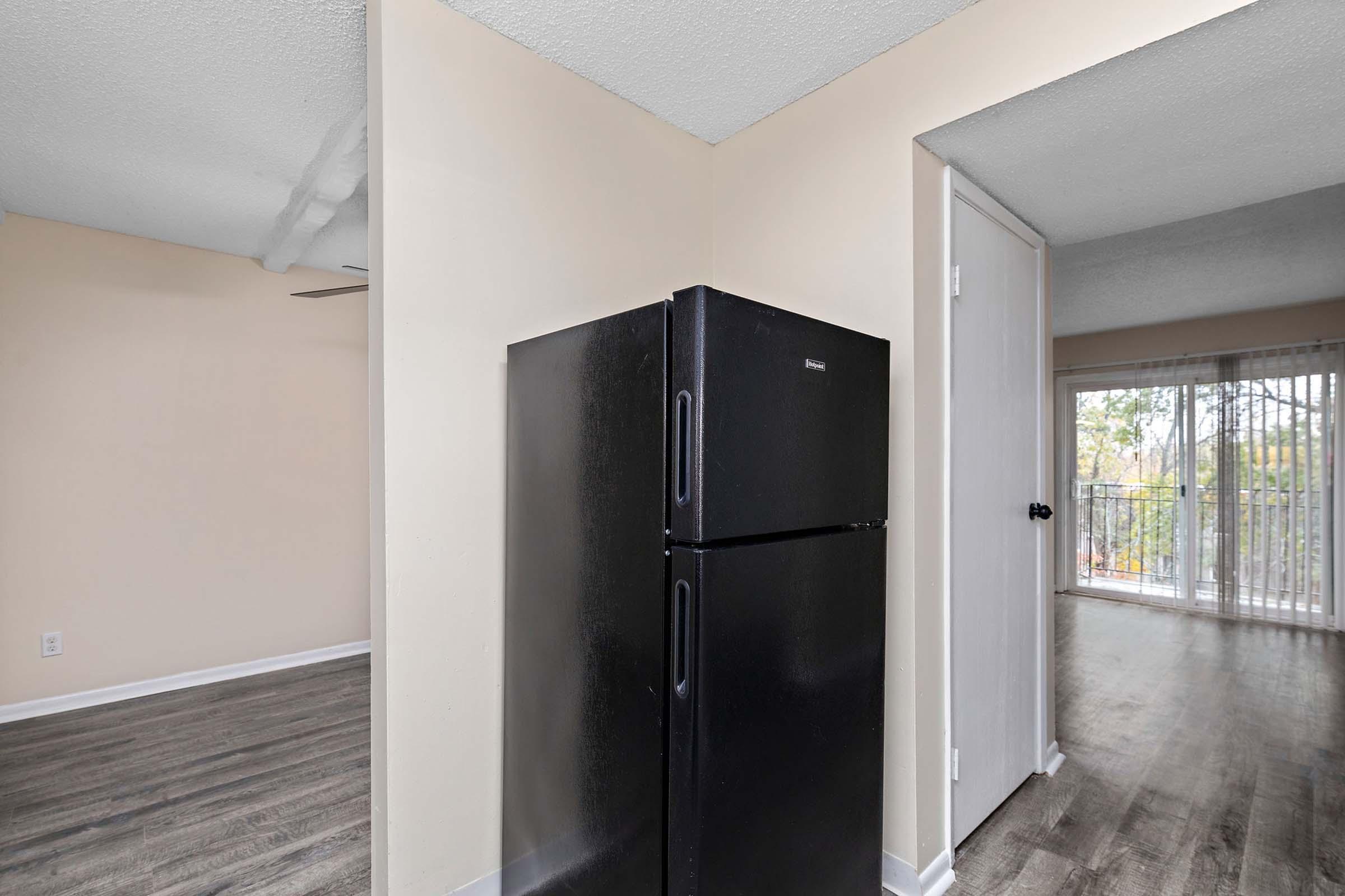 a stainless steel refrigerator in a kitchen