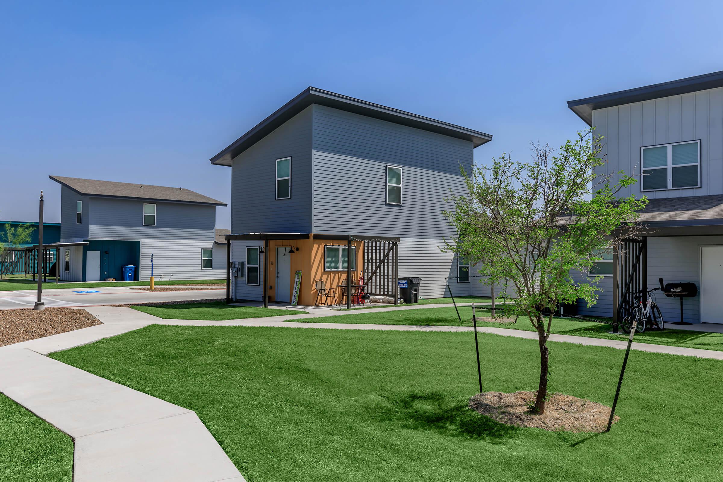 a large lawn in front of a house