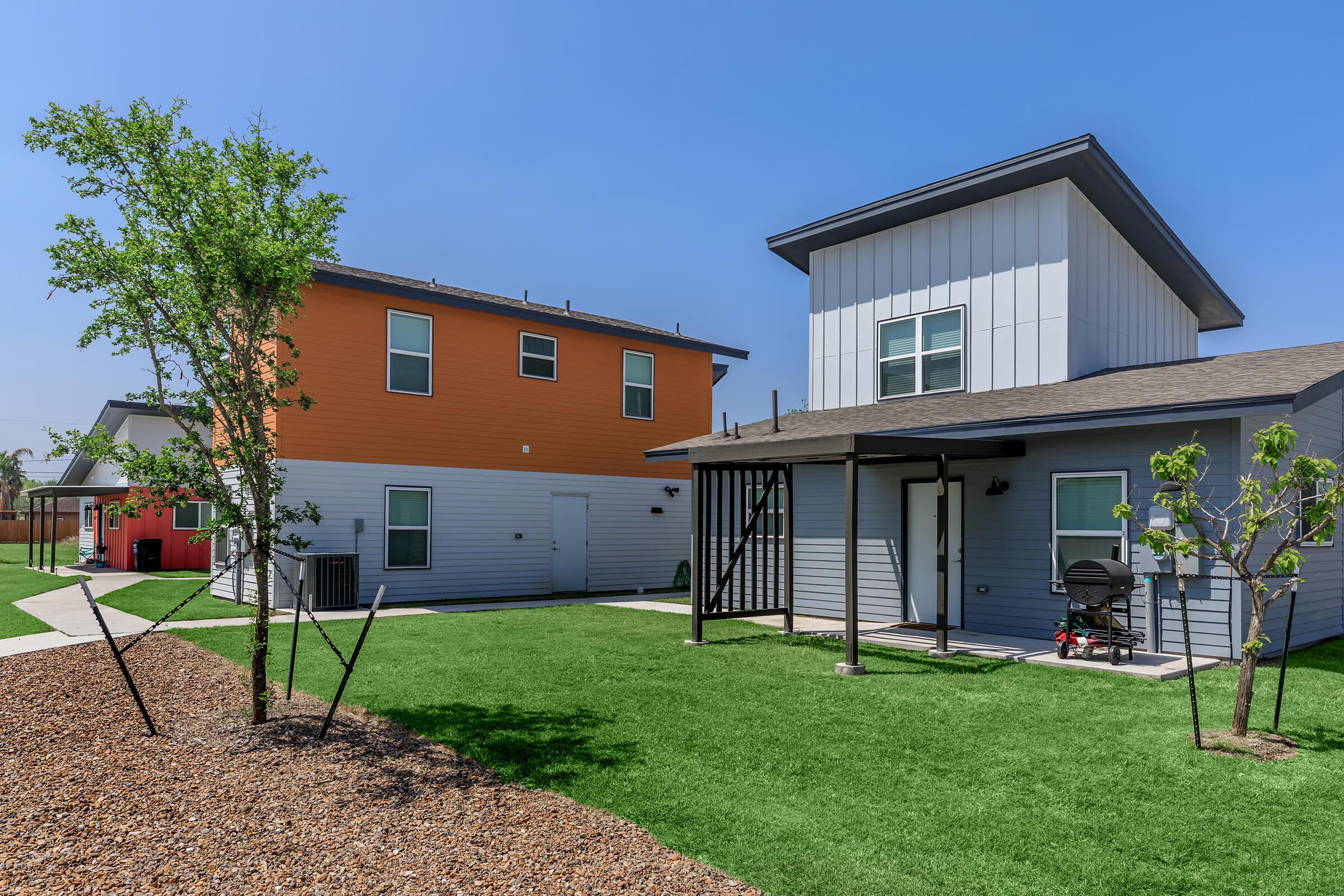 a large lawn in front of a house