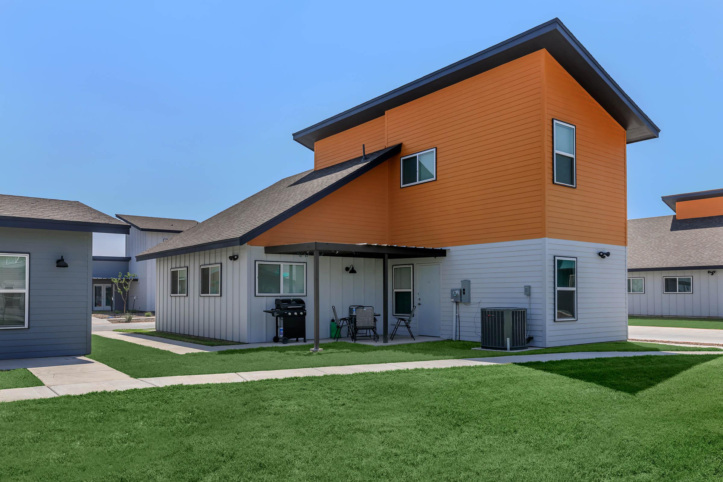 a large lawn in front of a house