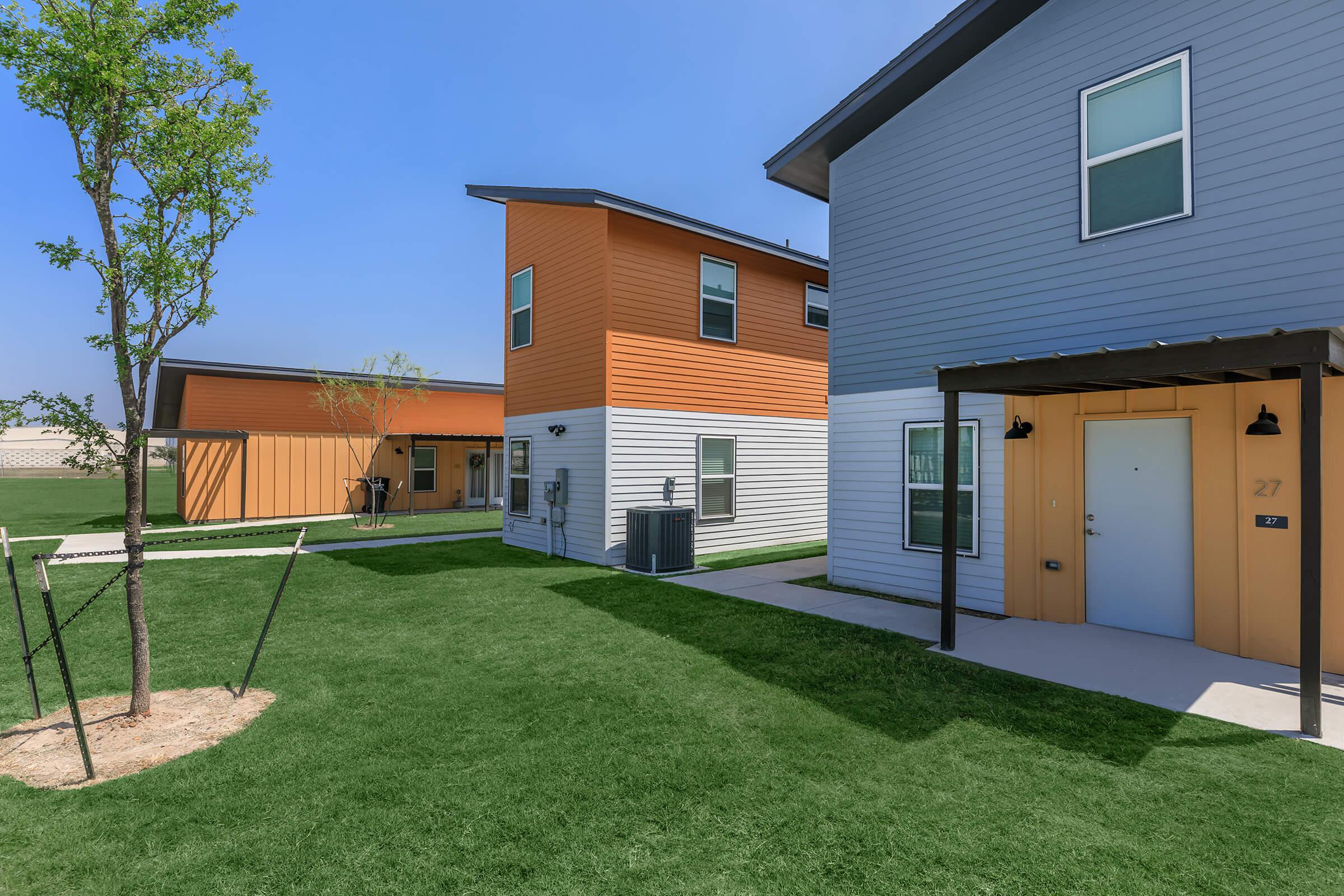 a large lawn in front of a house