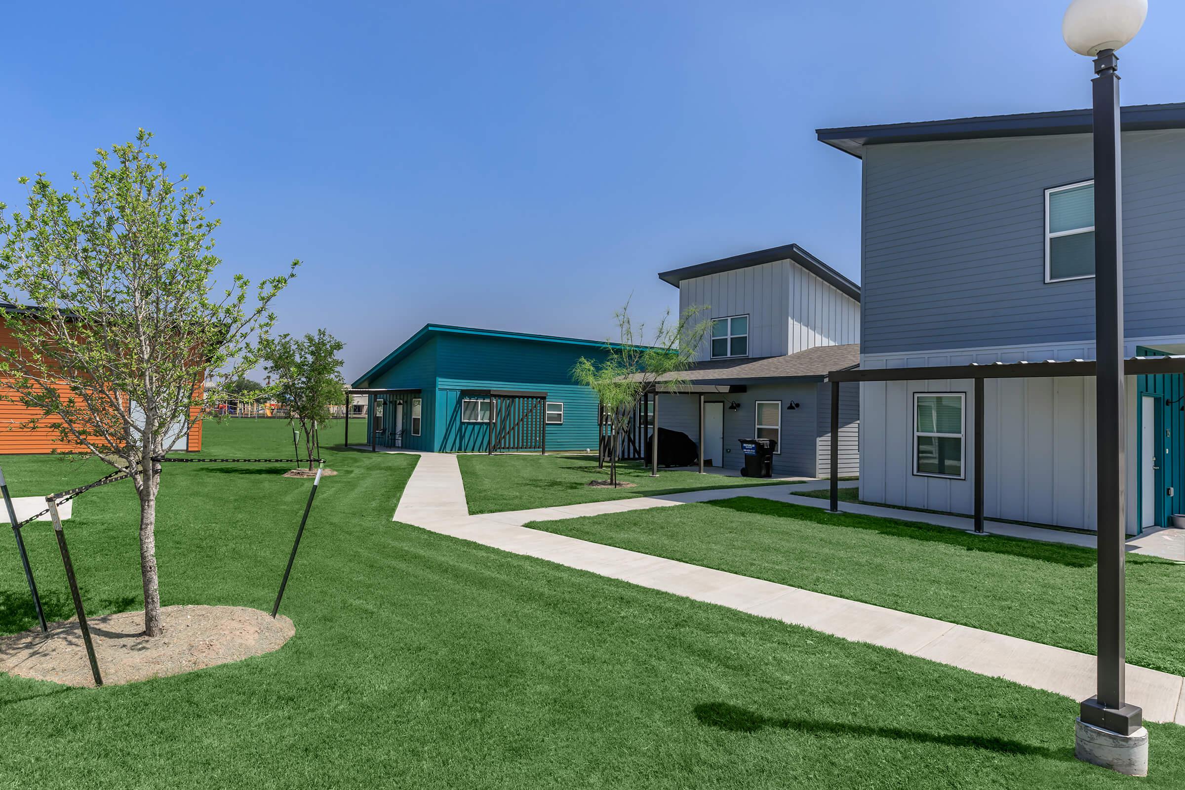 a large lawn in front of a house