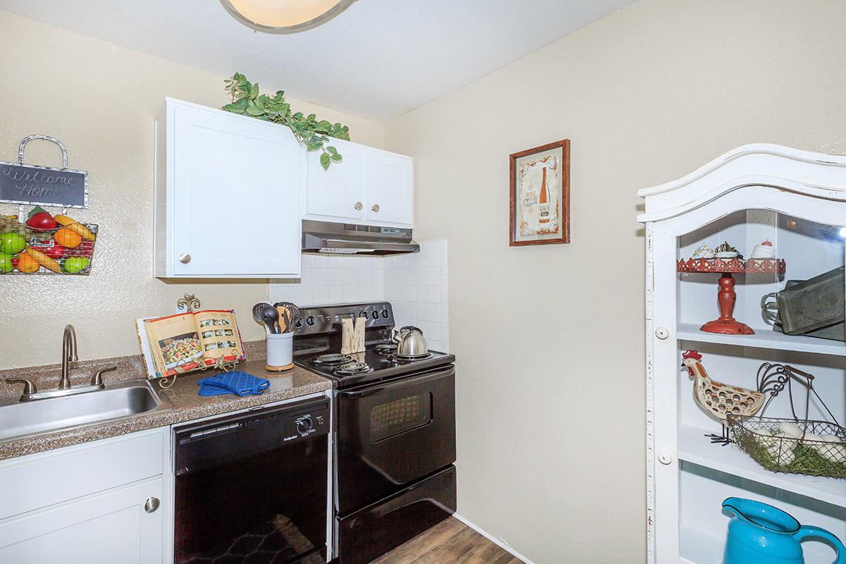 a kitchen with a table in a room