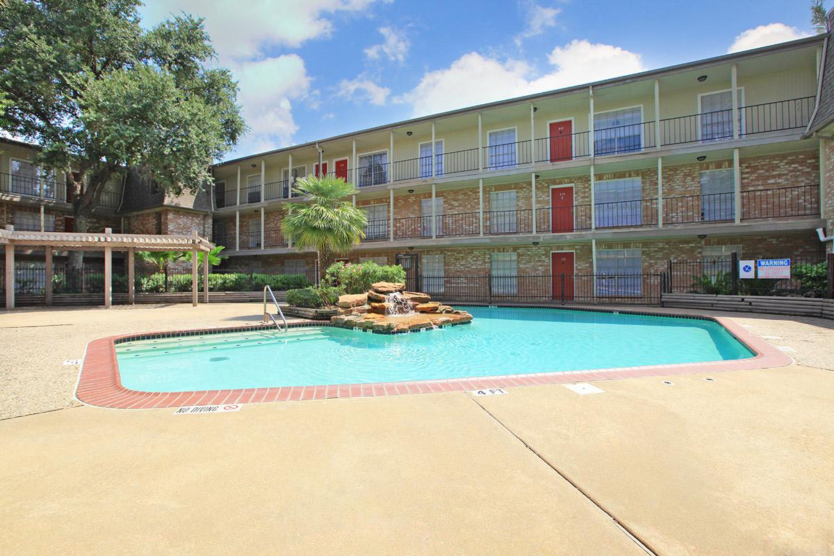 a pool next to a building