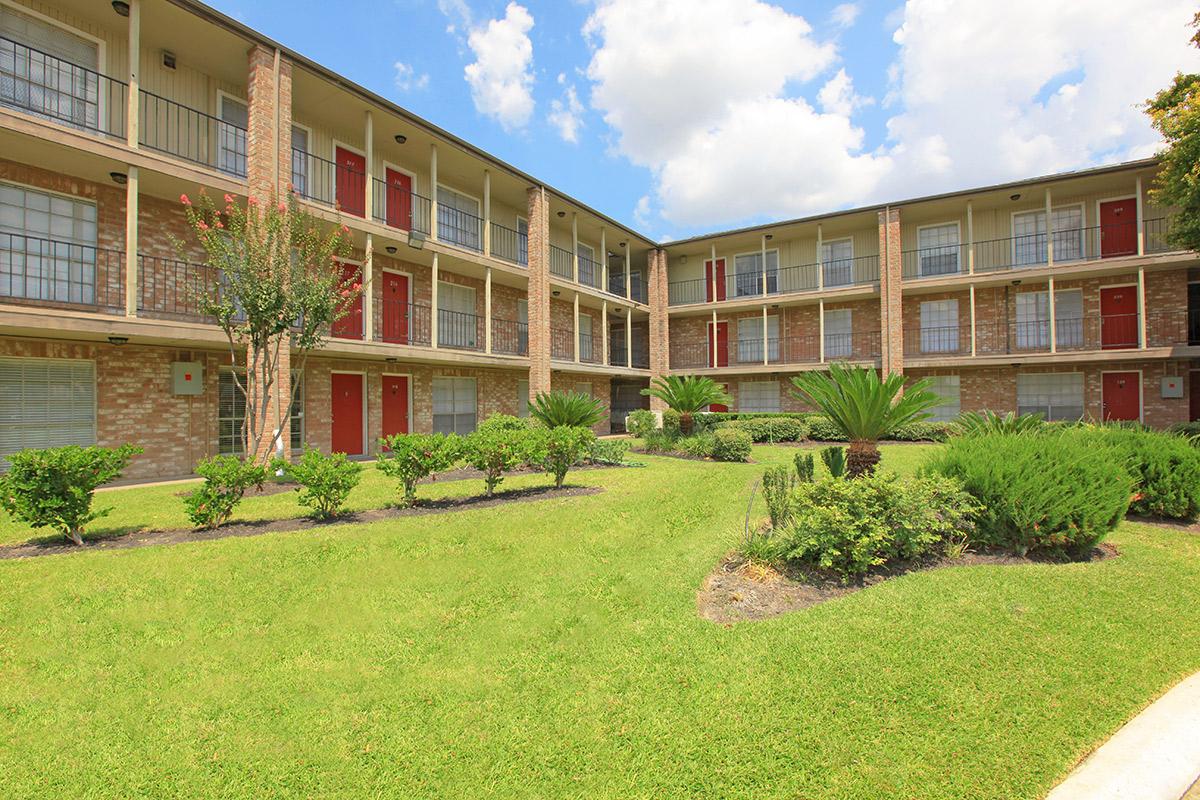 a large lawn in front of a building