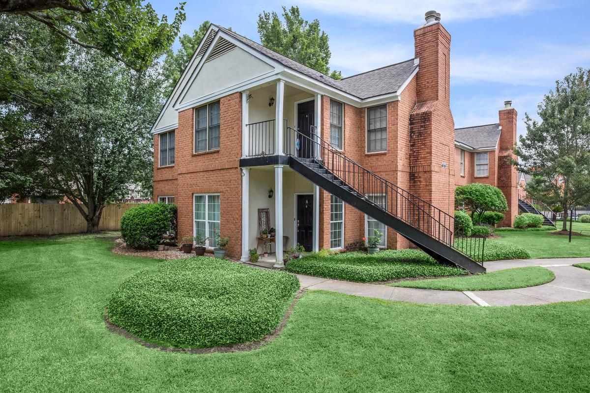 a large lawn in front of a house