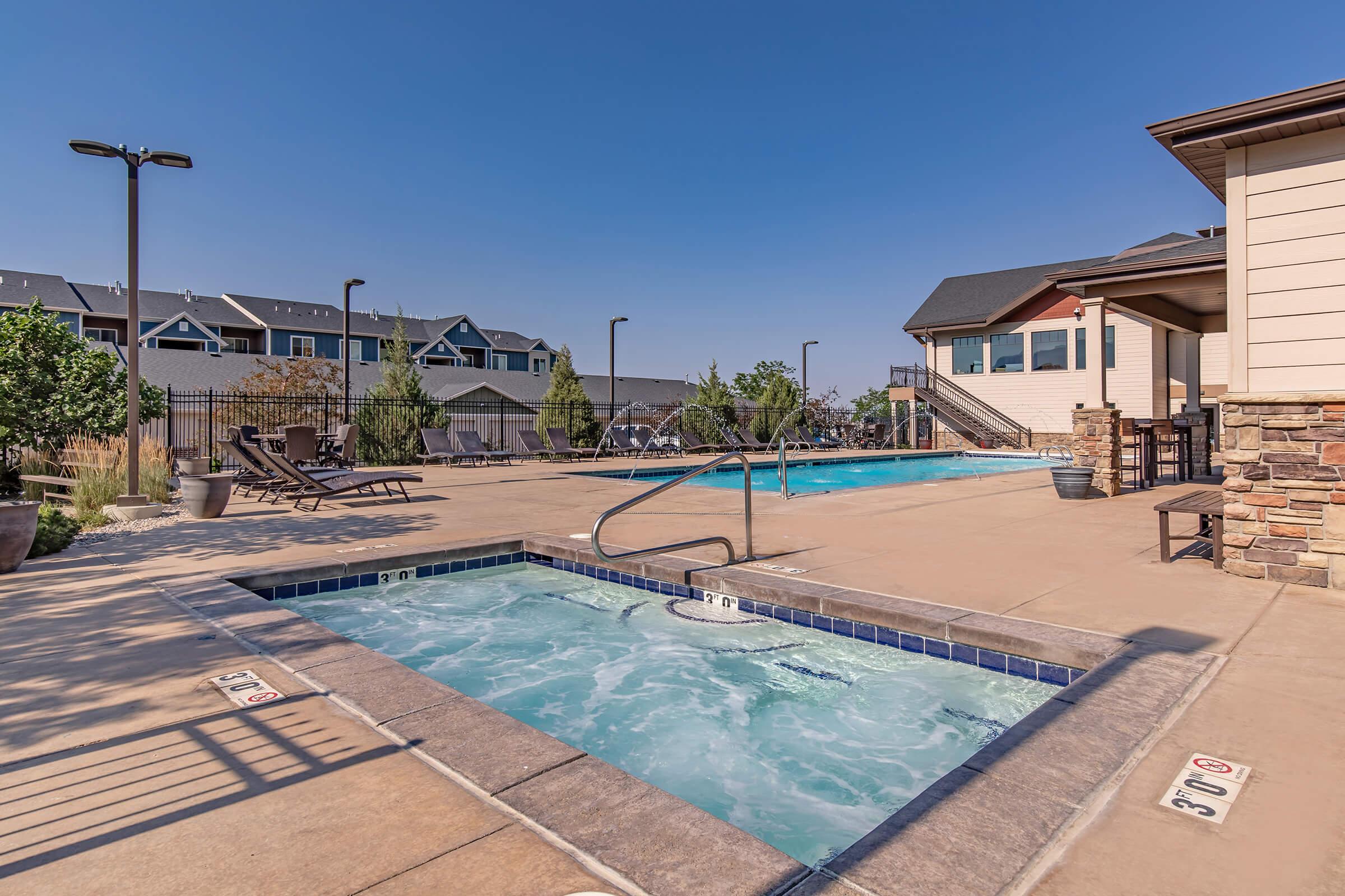 a pool next to a building