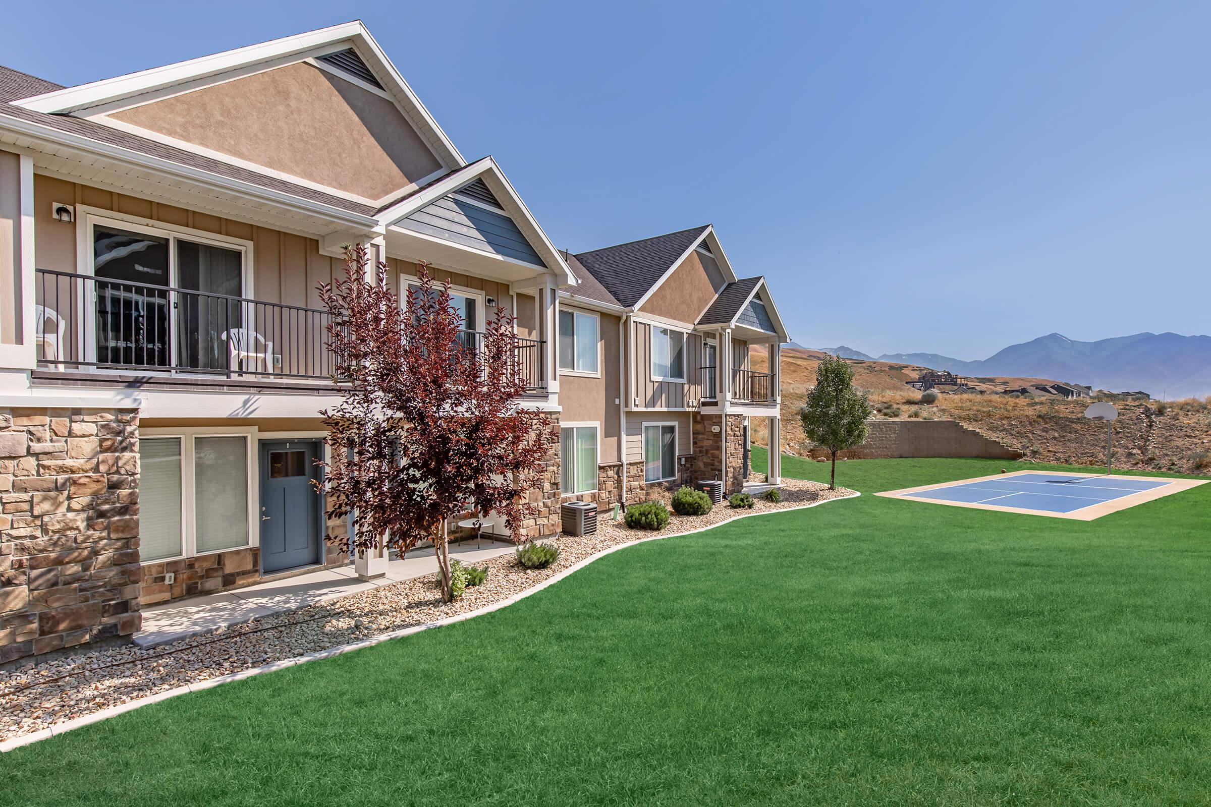 a large lawn in front of a house