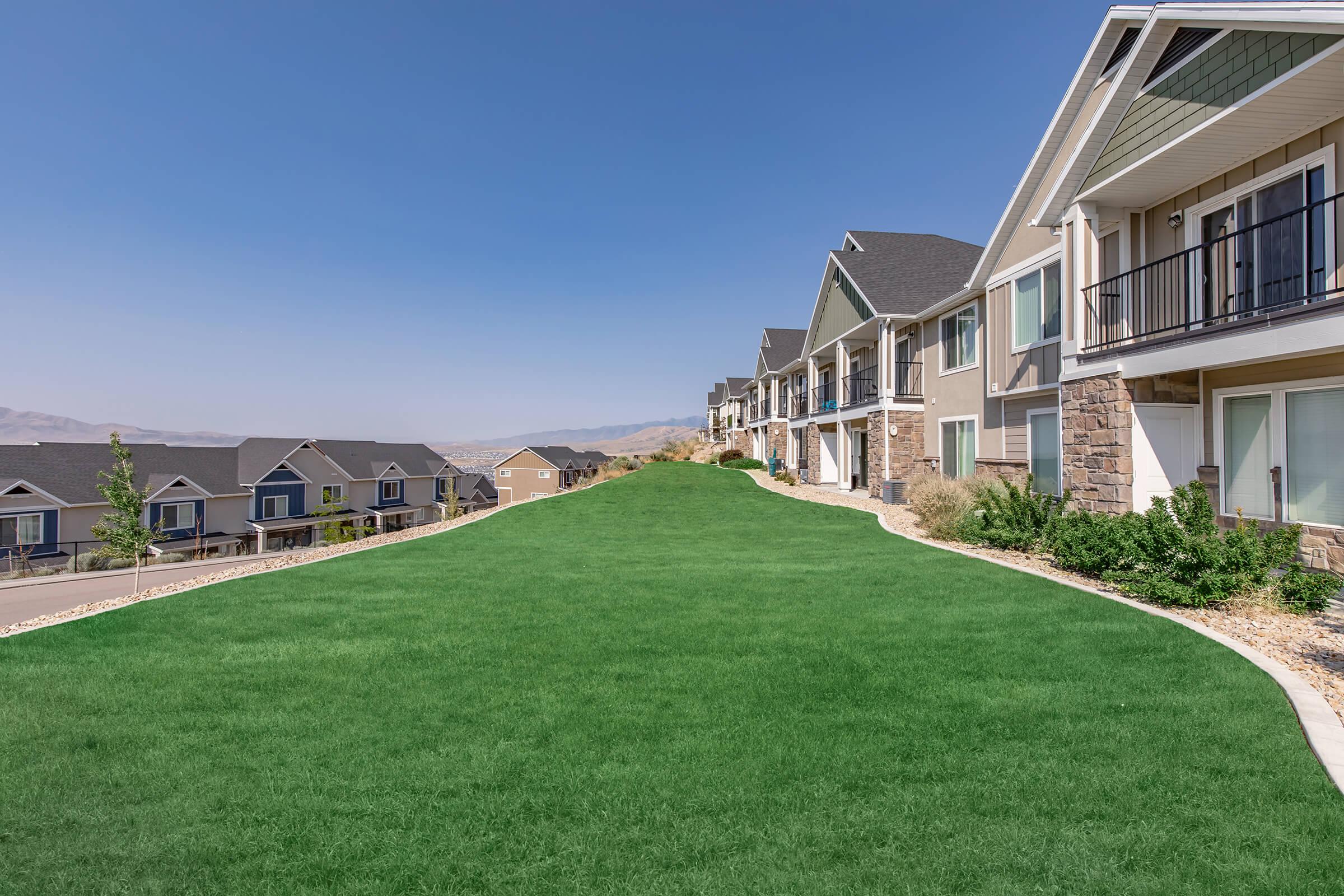 a large lawn in front of a house