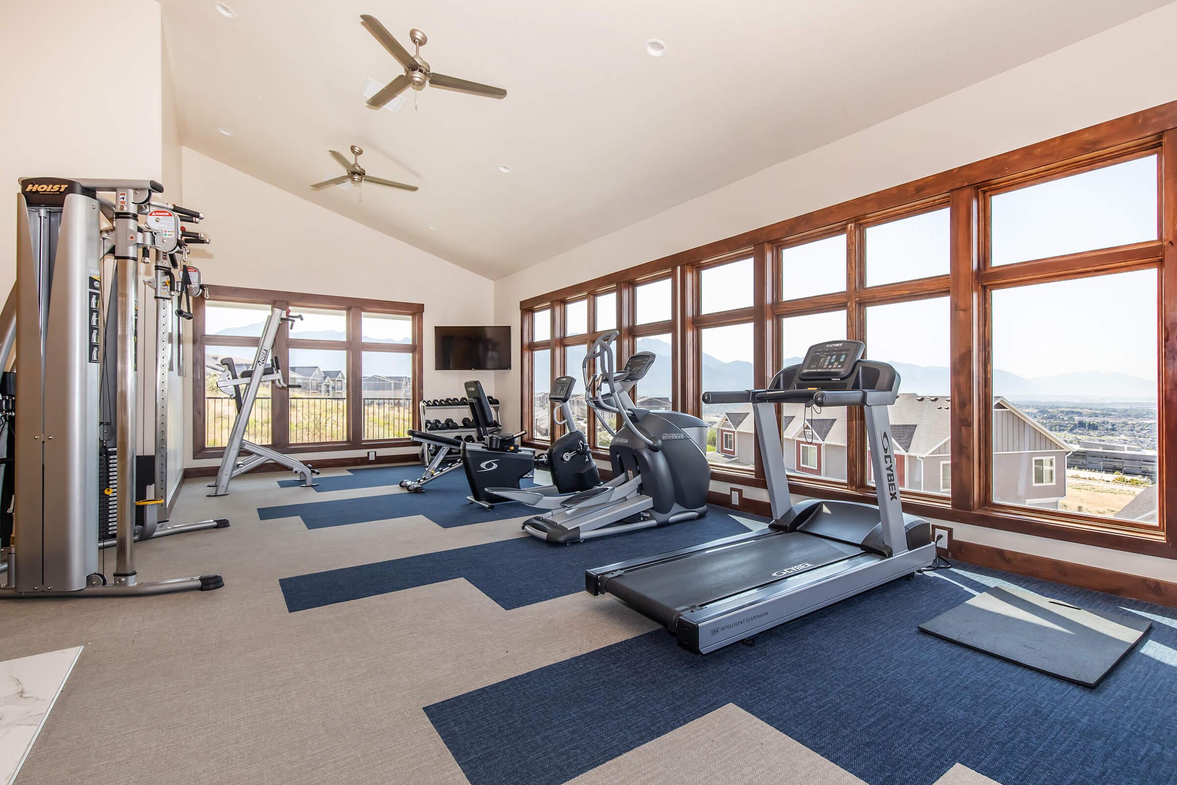 a room filled with furniture and a large window