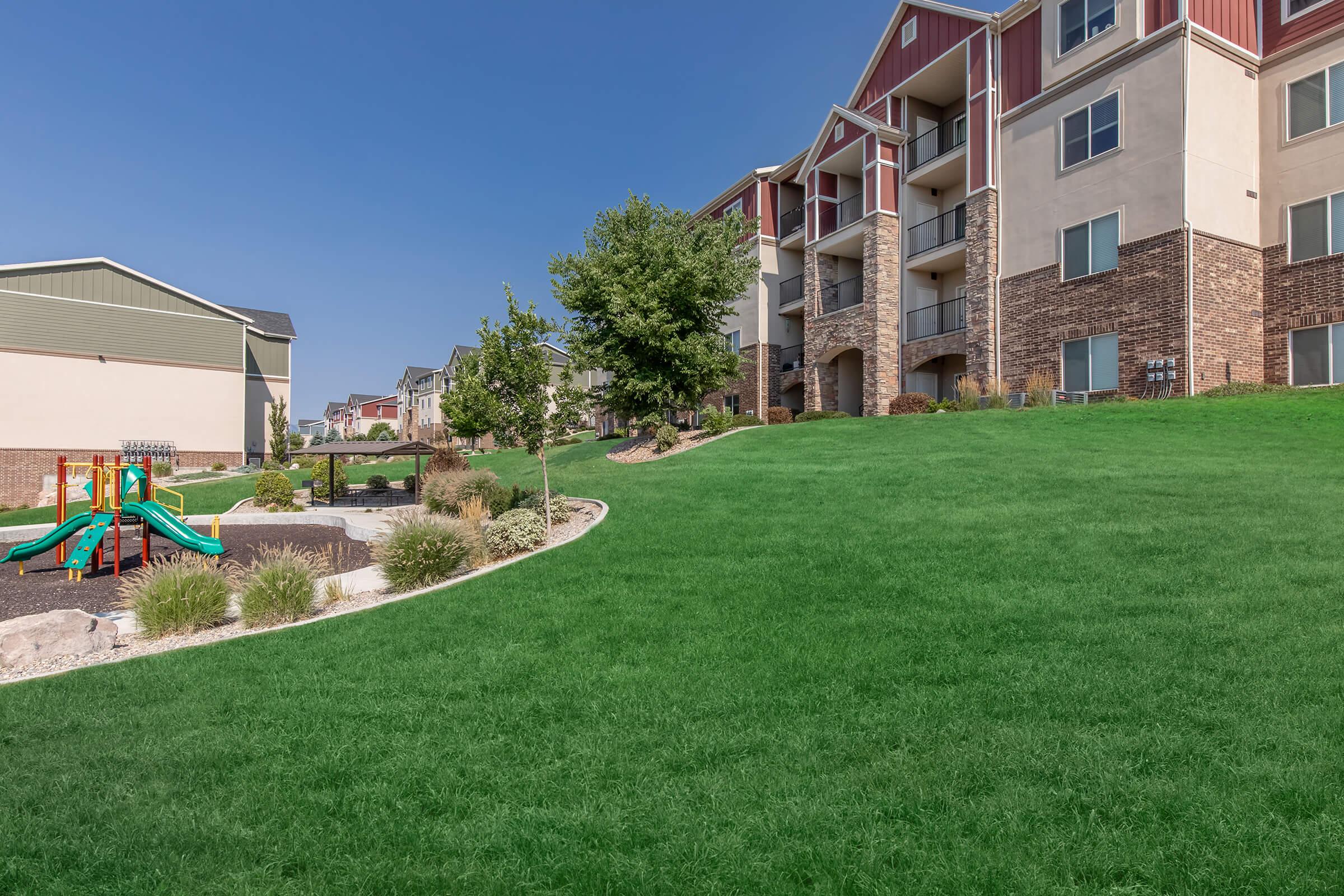 a large lawn in front of a building