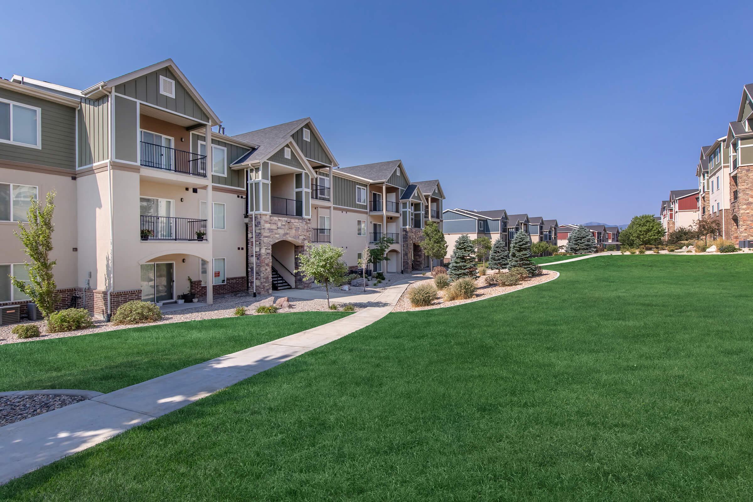 a large lawn in front of a house