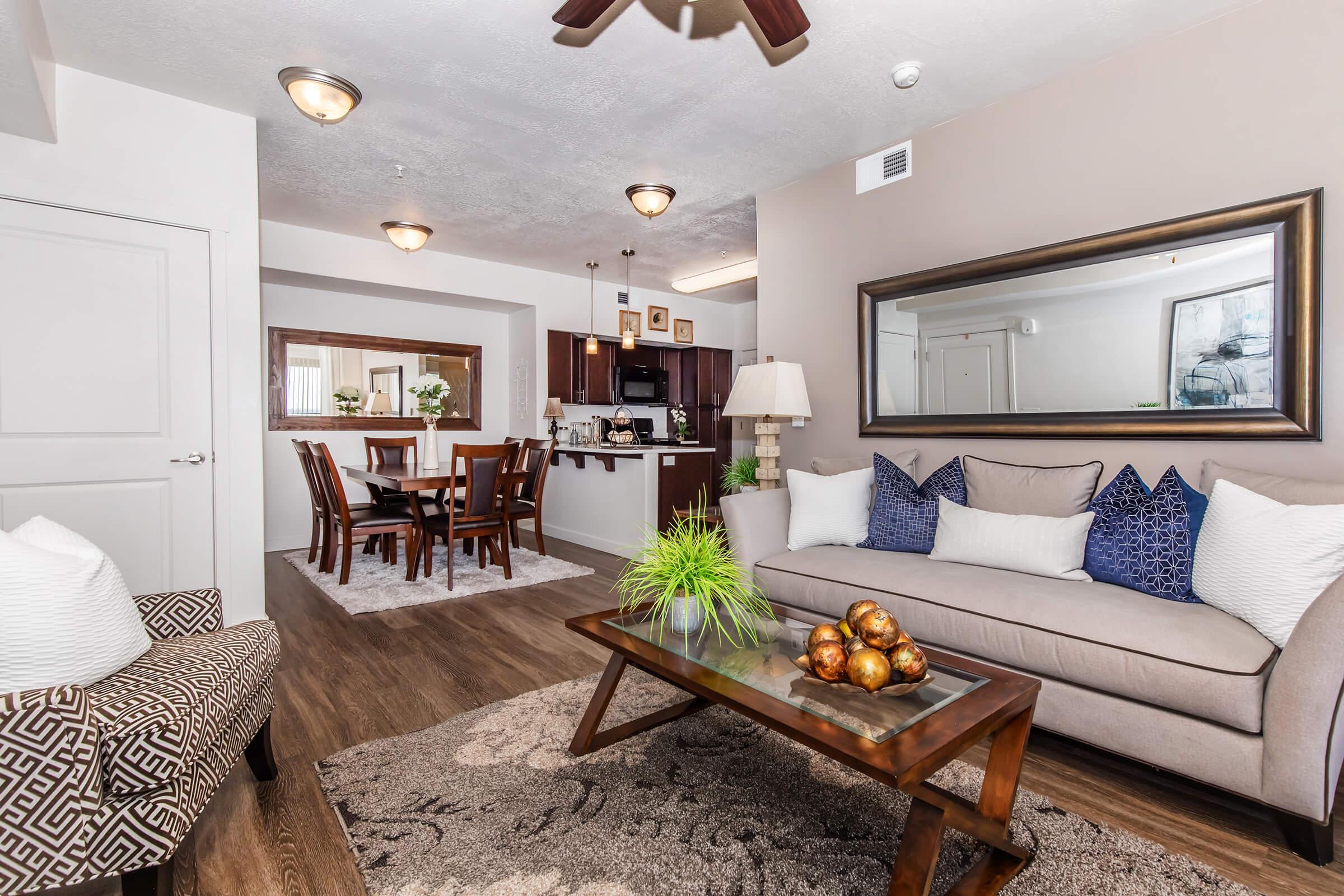 a living room filled with furniture and a fire place