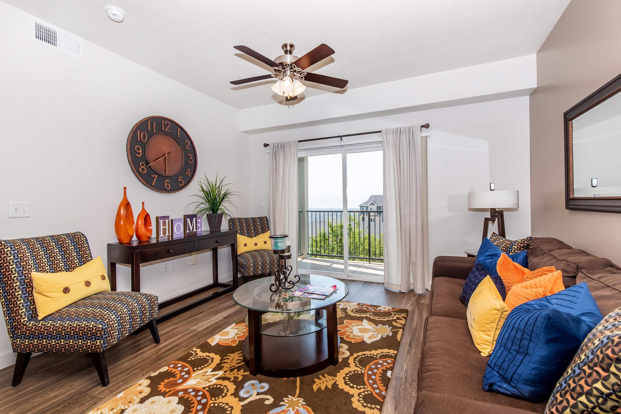 a living room filled with furniture and a fire place