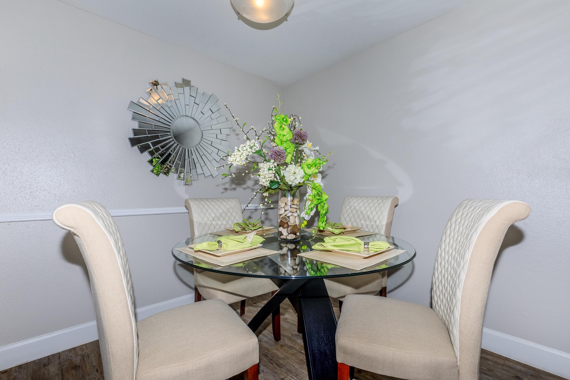 a room filled with furniture and a table