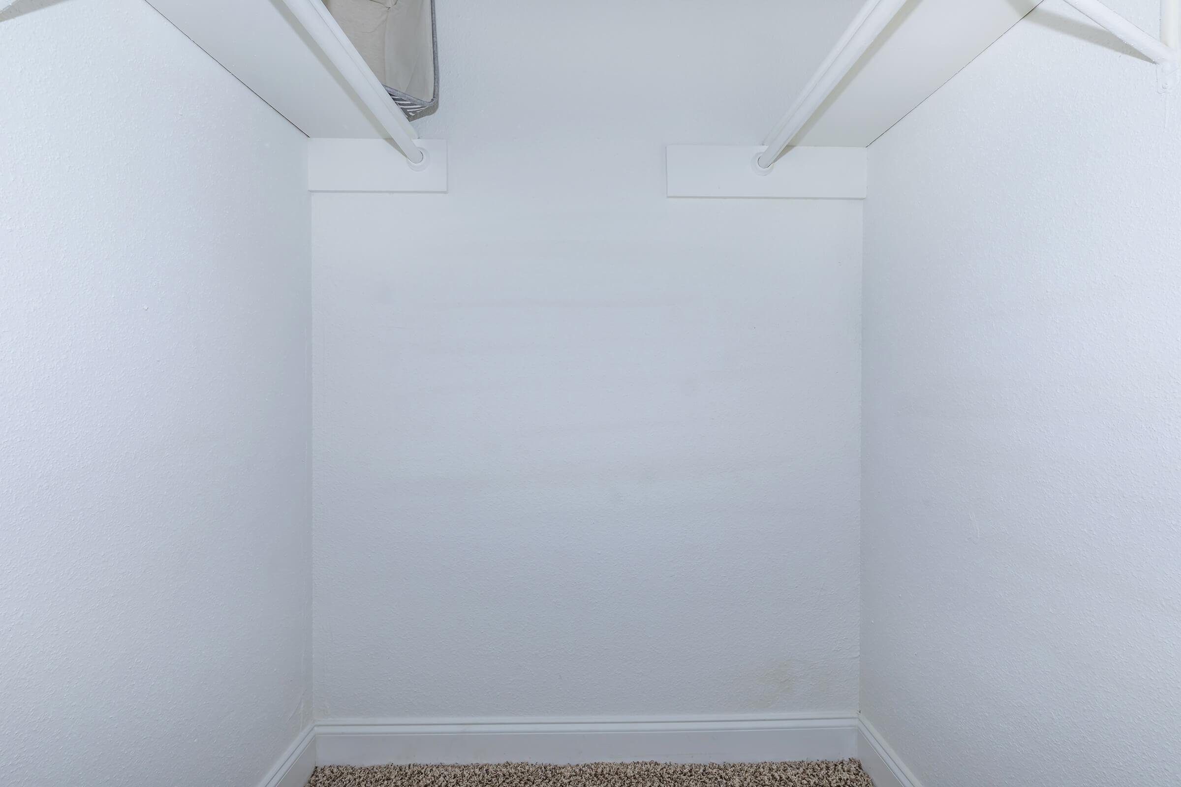 a white tub sitting next to a door
