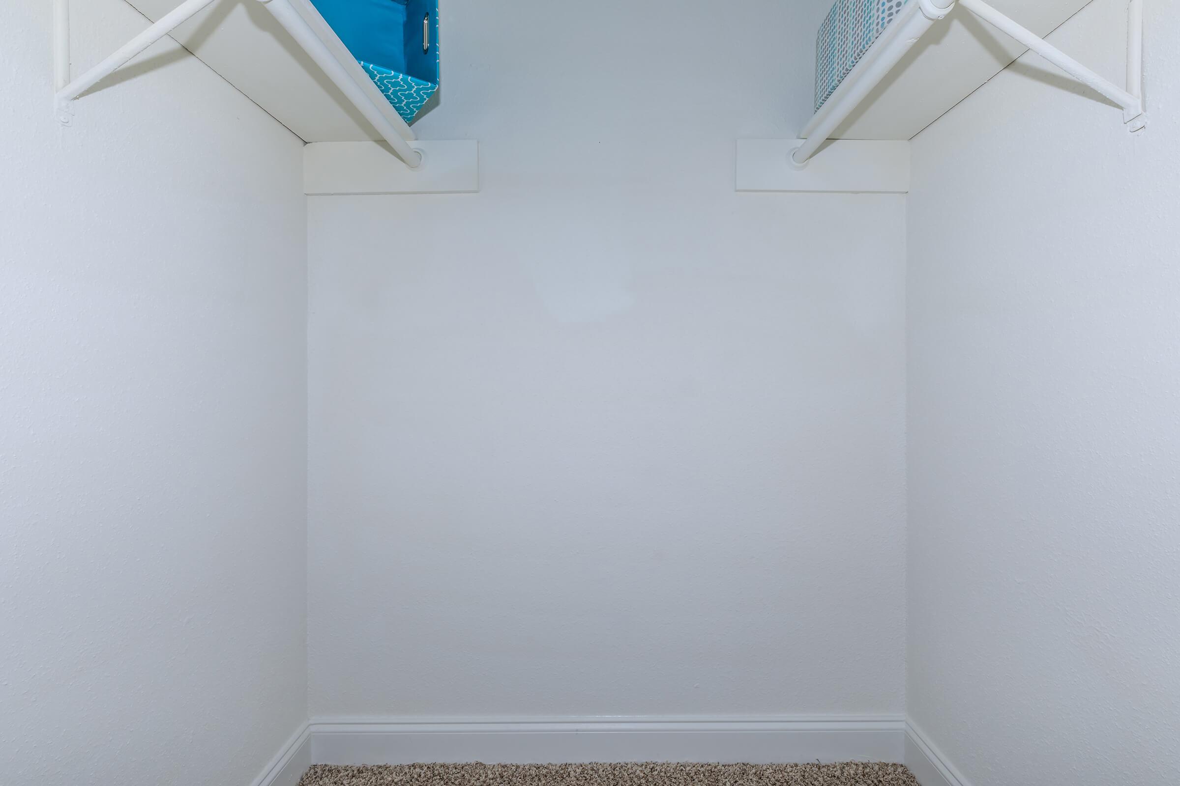 a white tub sitting next to a door