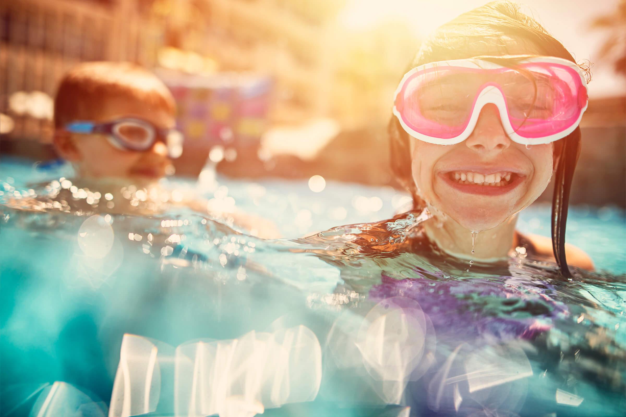 kids in pool, close up - iStock-685842534.jpg