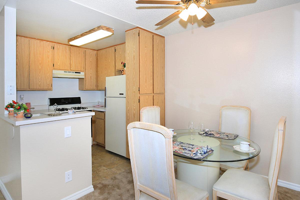 a kitchen with a table in a room