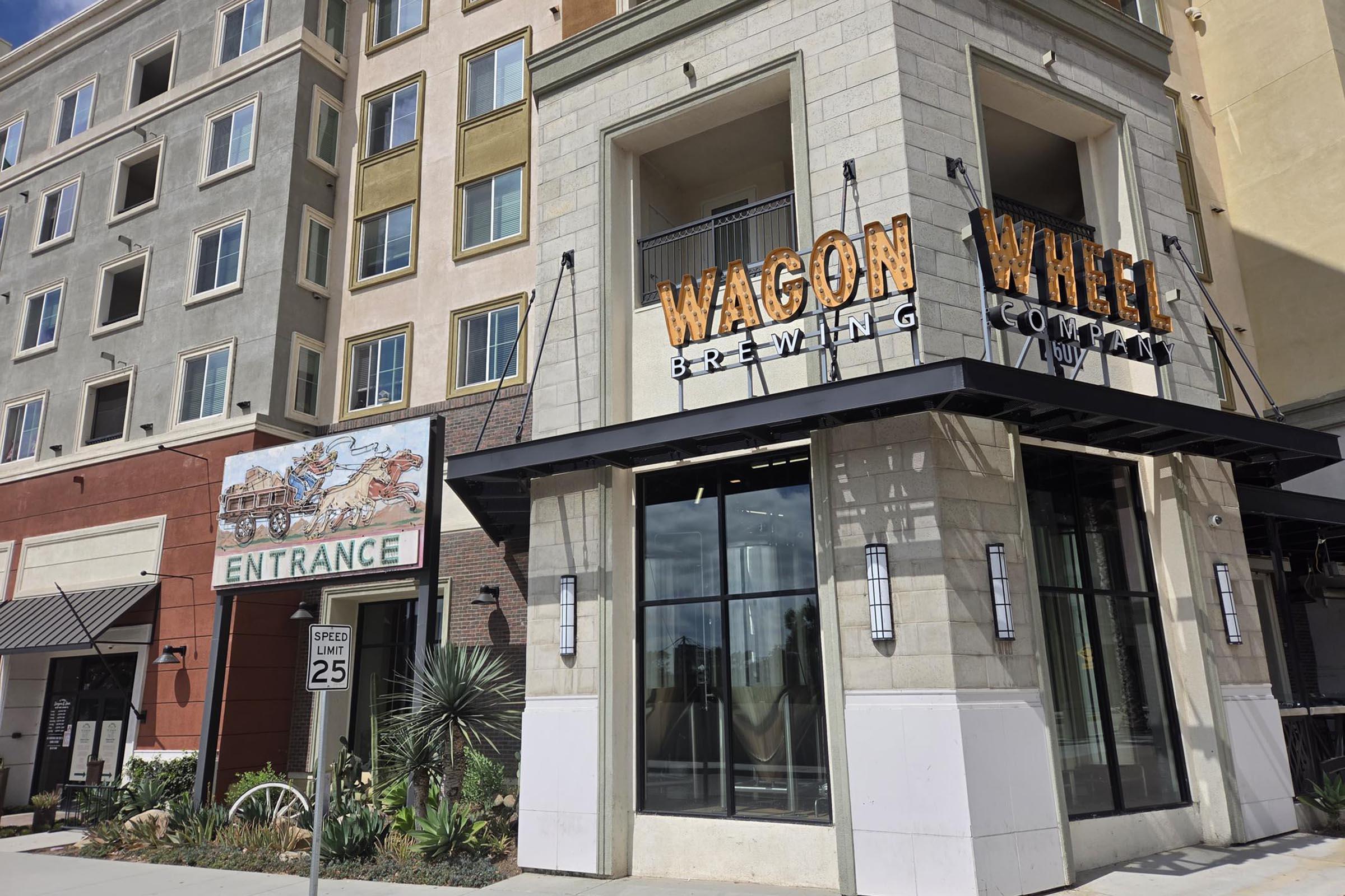 Experience the perfect blend of modern living and vibrant community at our welcoming entrance, just steps away from the lively Wagon Wheel Brewing Company, where every day feels like a celebration.