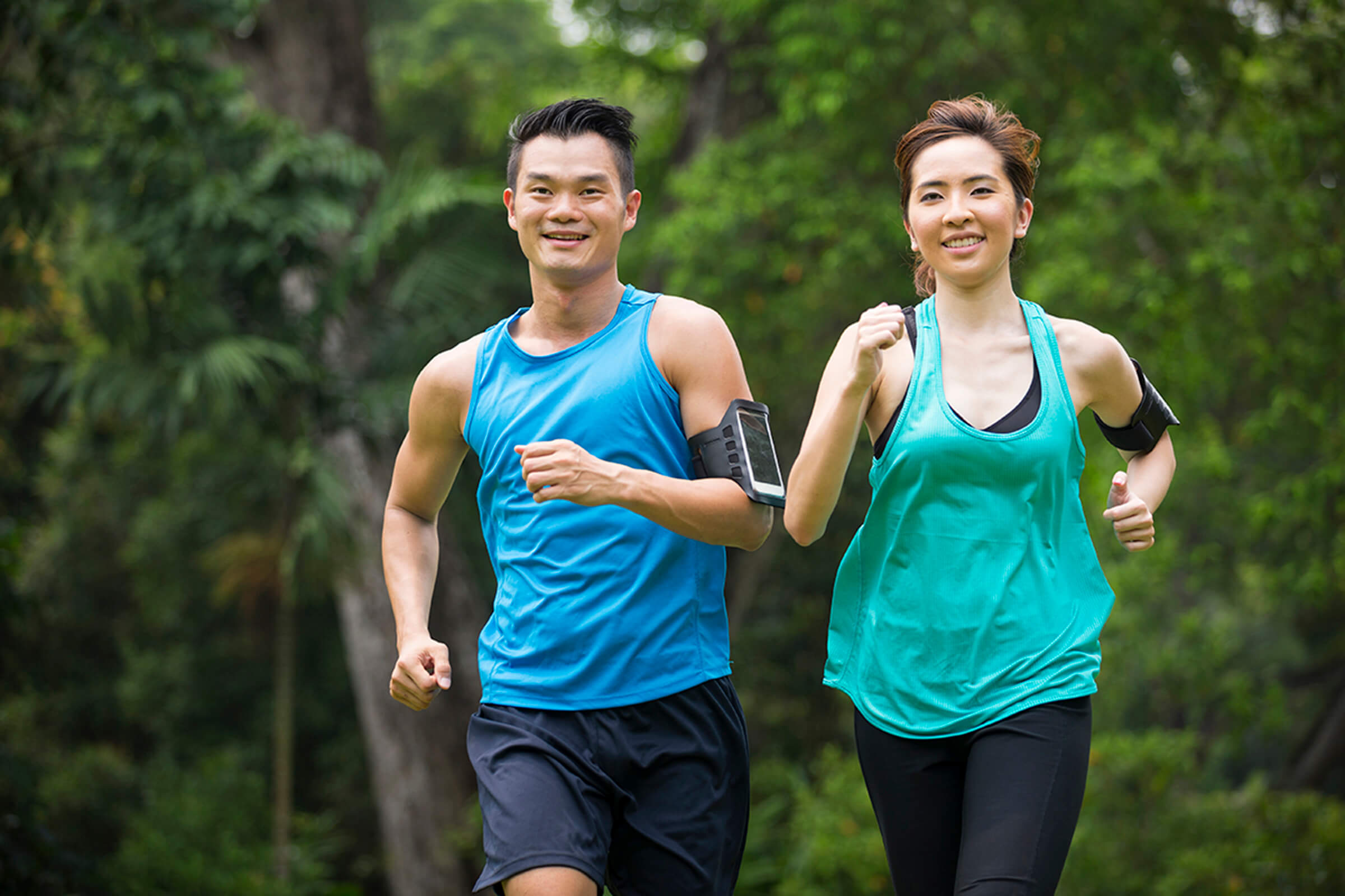a woman and man jogging
