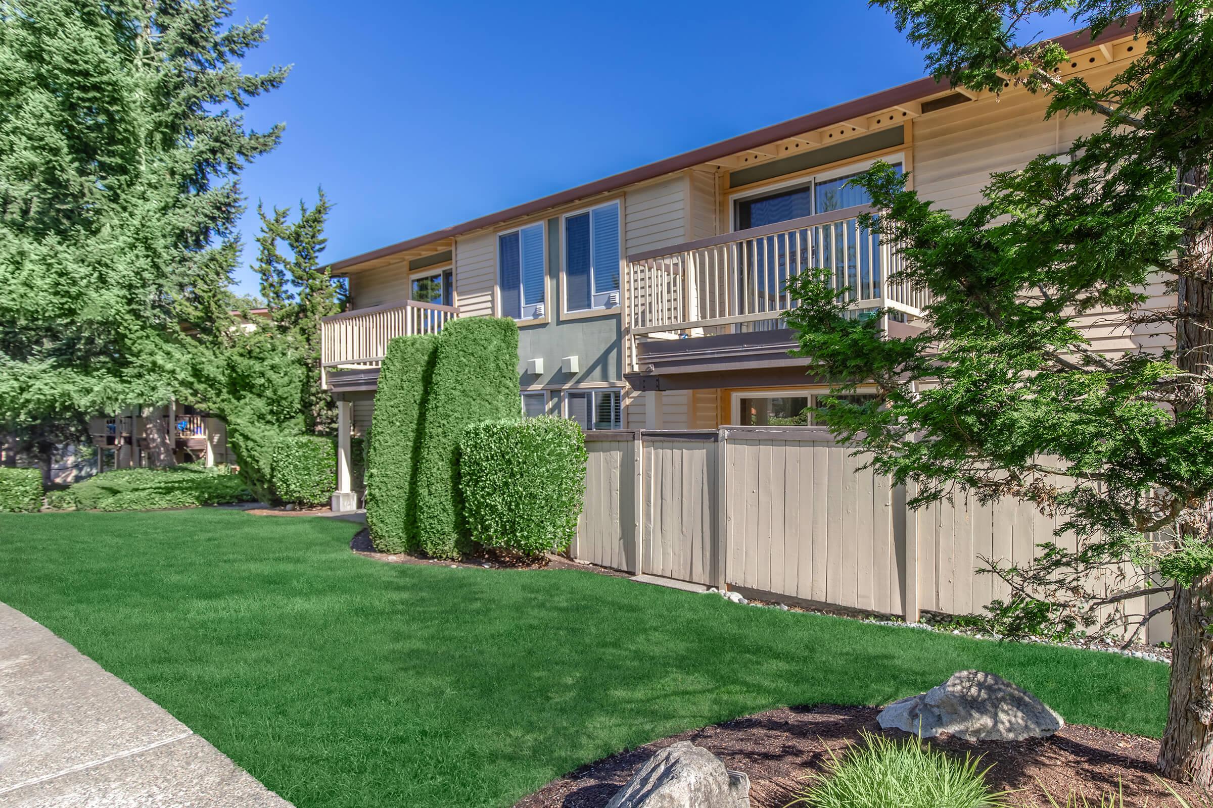 a large lawn in front of a house