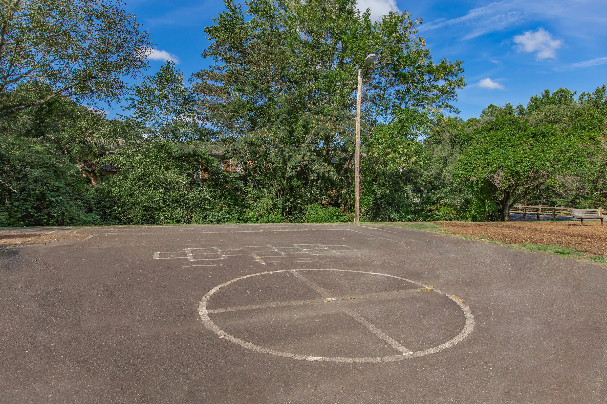 a basketball in a parking lot