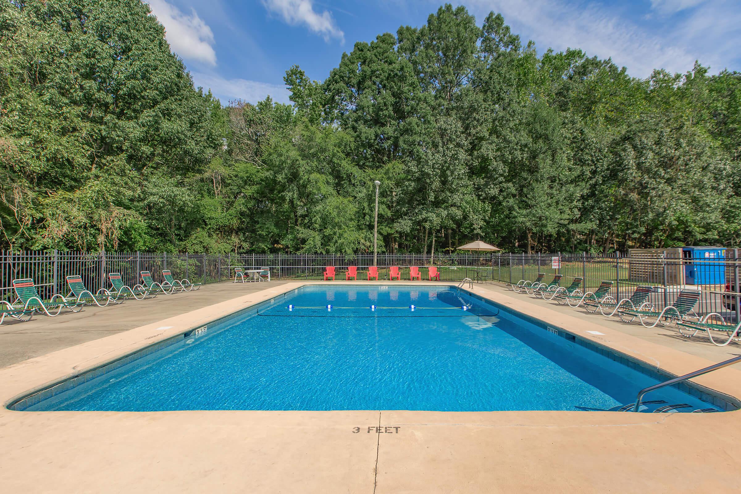 a pool next to a body of water