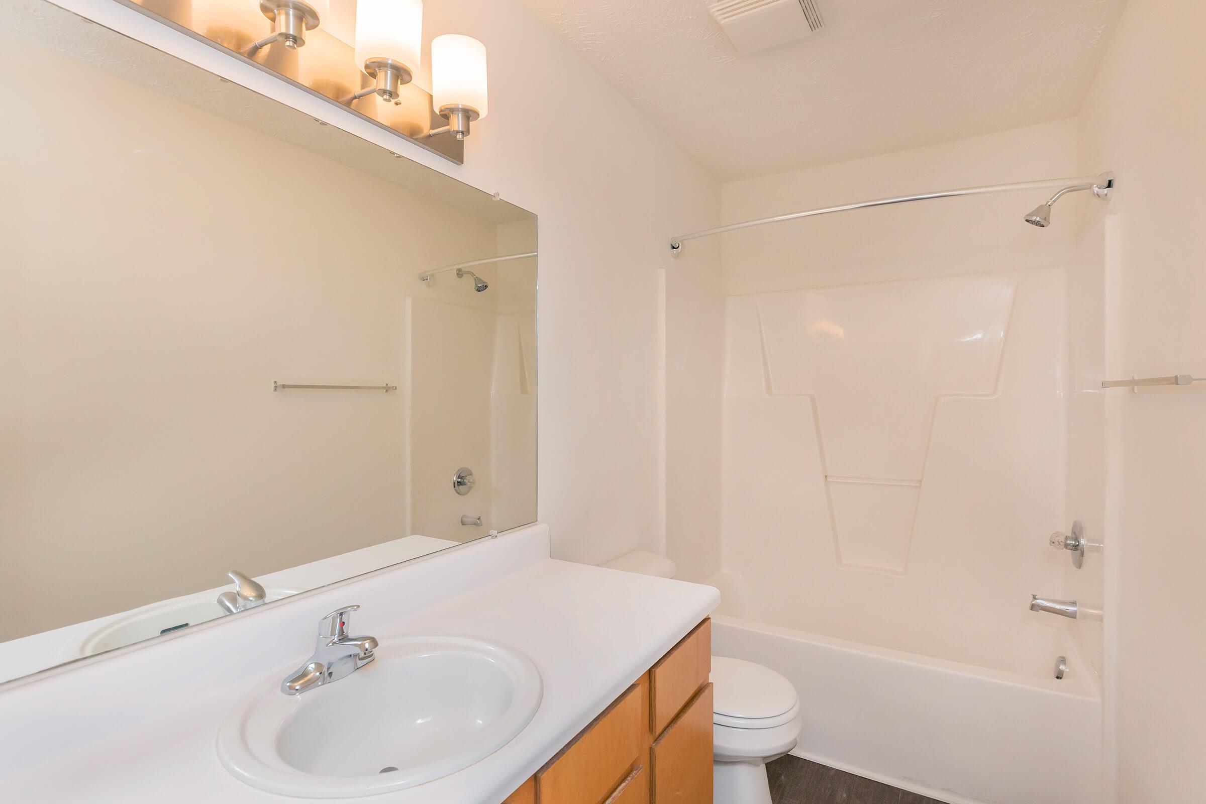 Contemporary bathrooms at Tesla Park in Wilmington, NC.