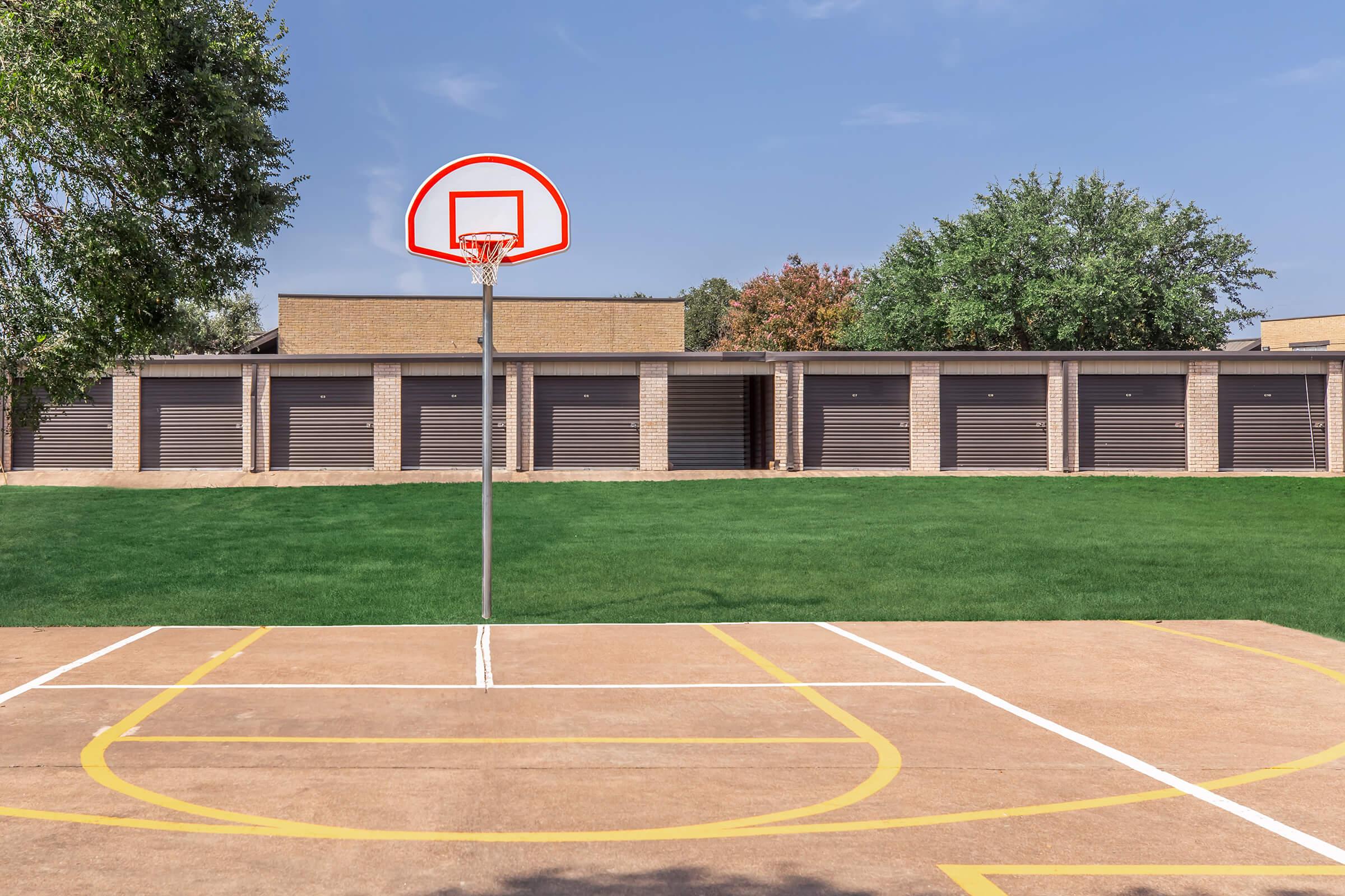 a sign on a basketball court