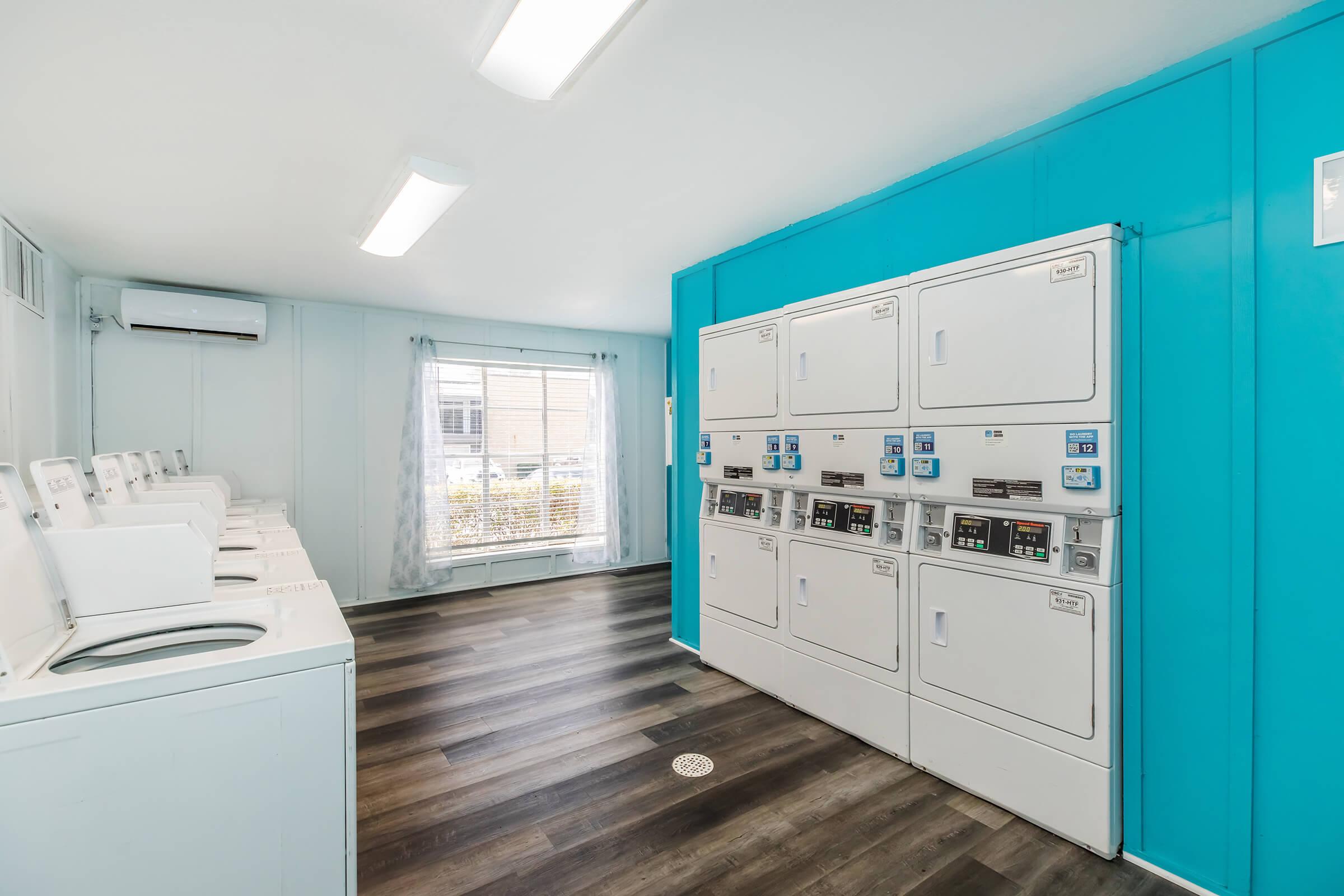 a kitchen with a blue background