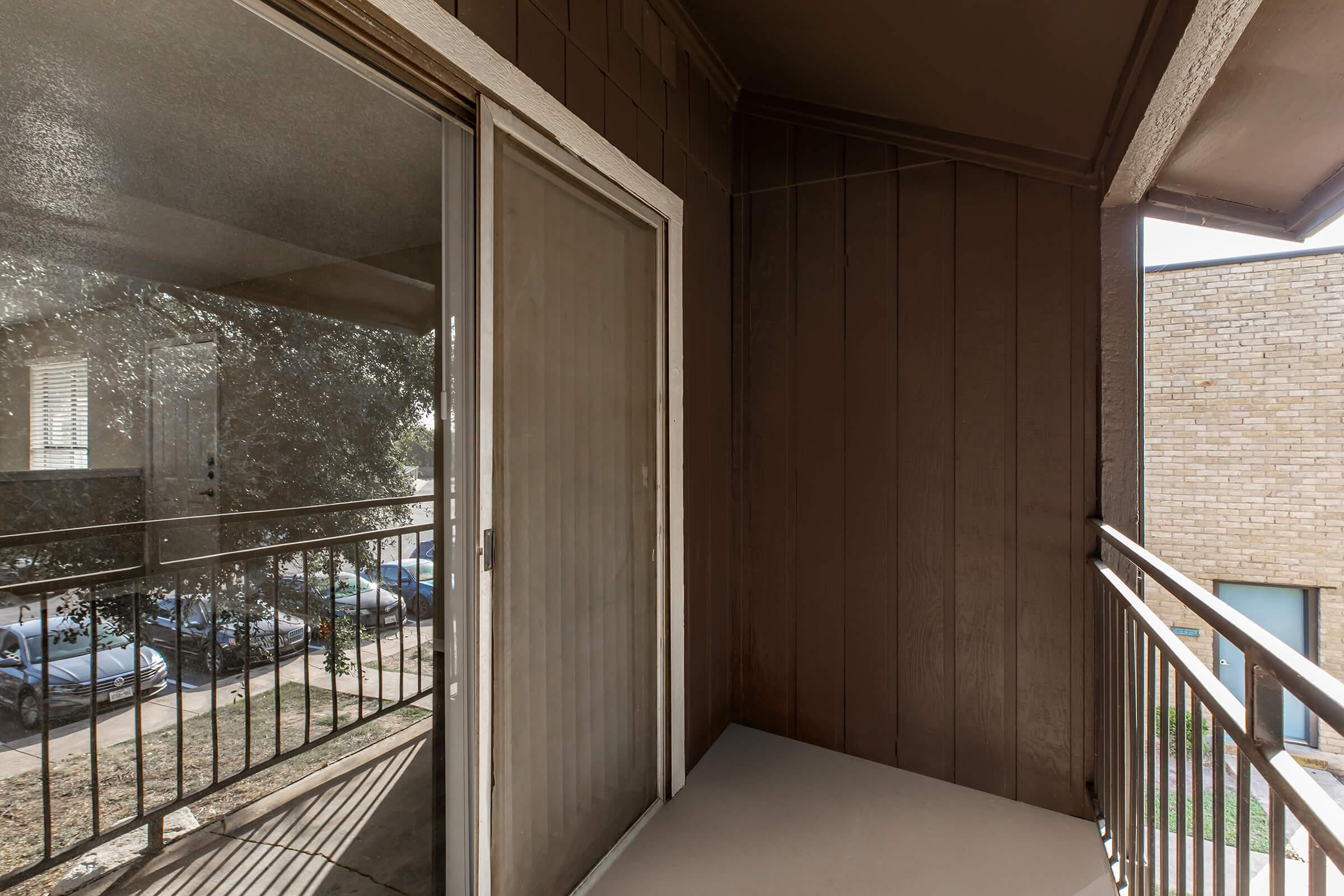 a room with a wooden fence