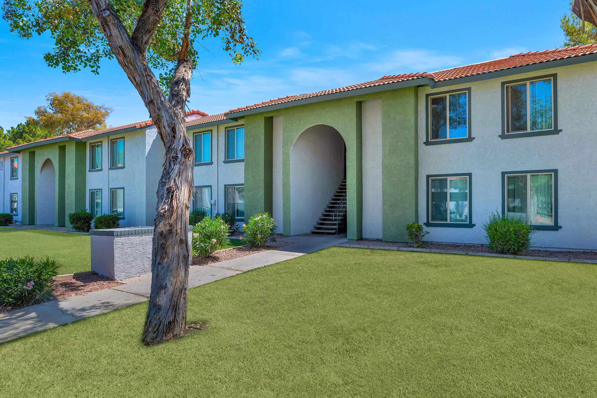 a large lawn in front of a house