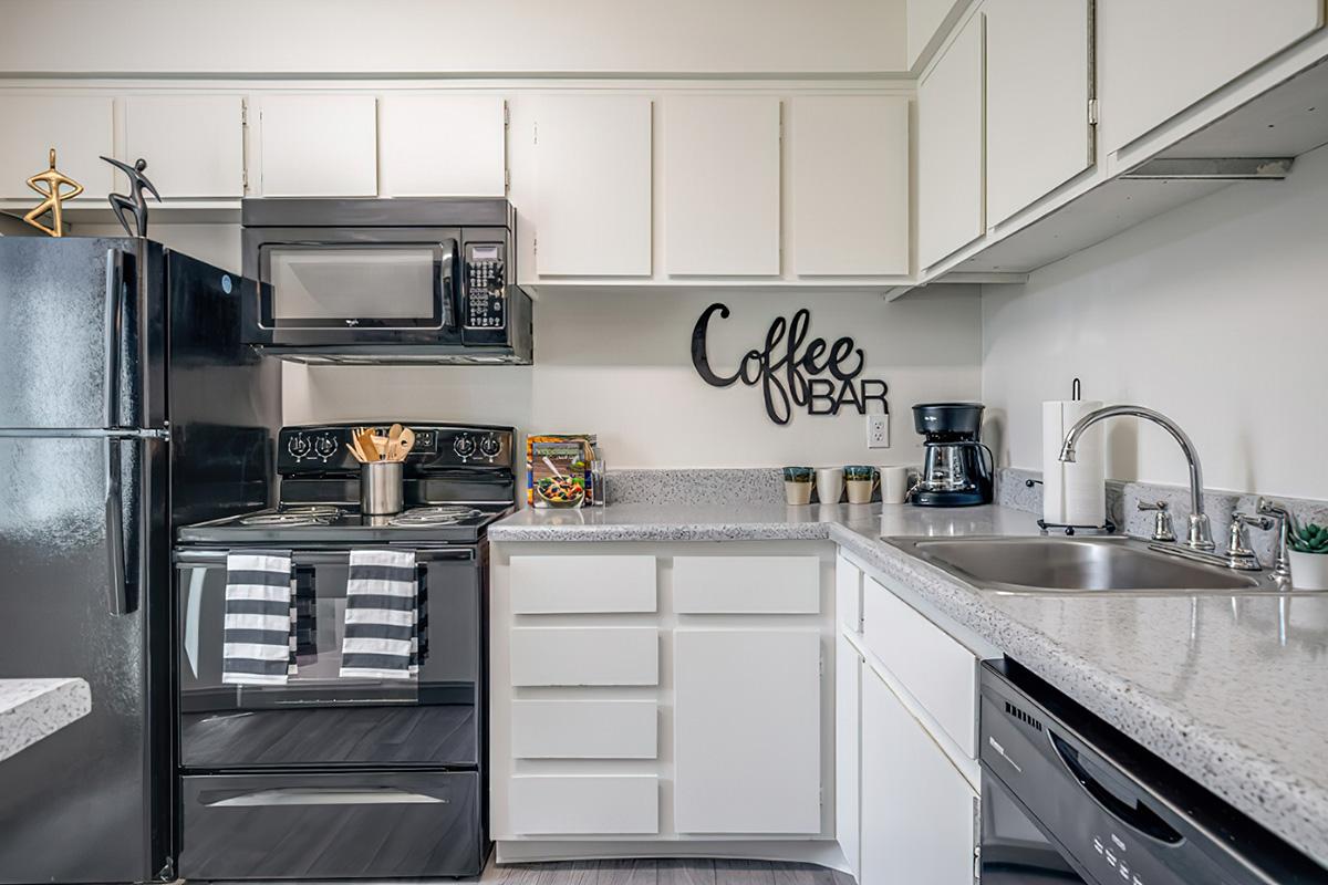 a kitchen with stainless steel appliances