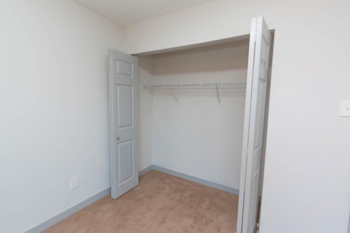 a large white refrigerator in a kitchen