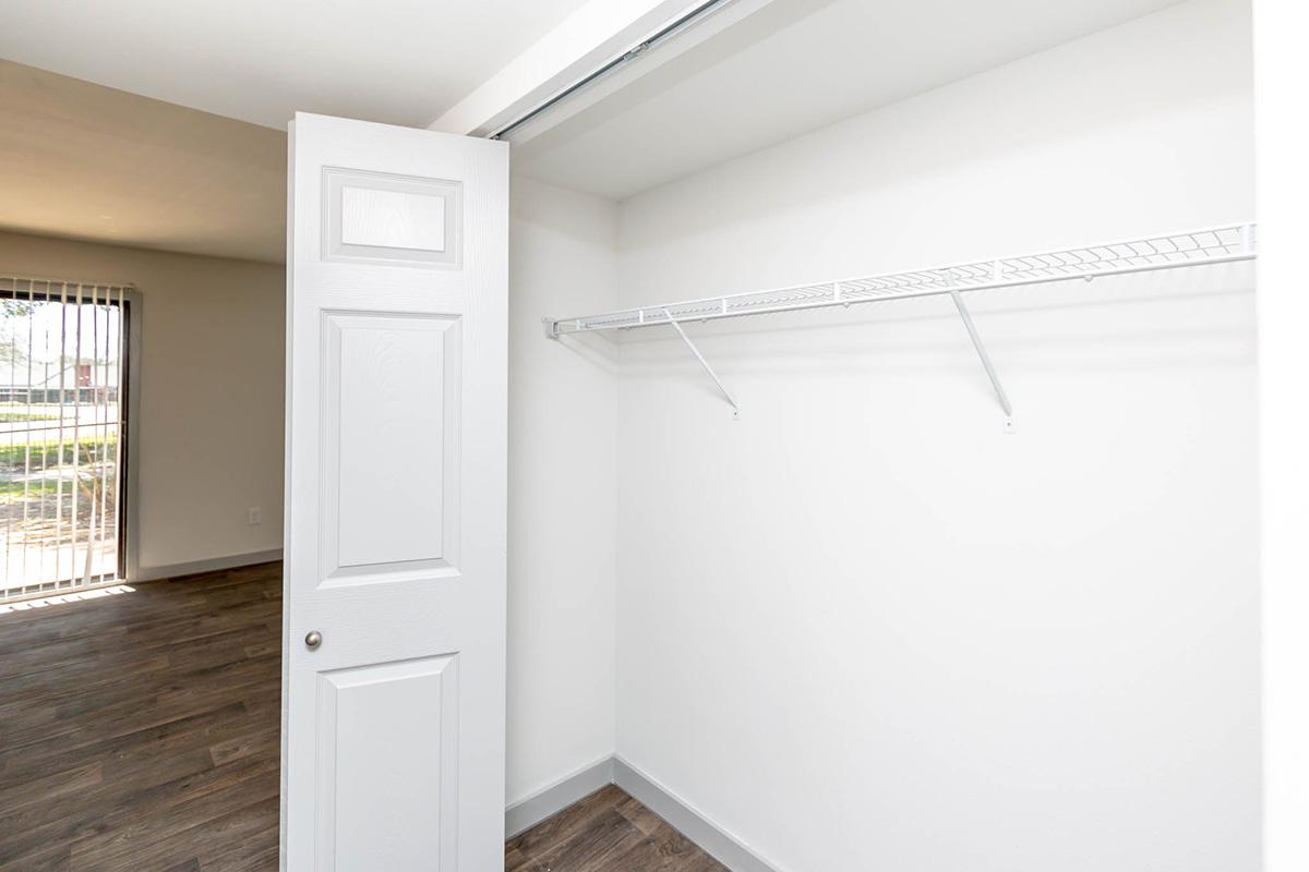 a white refrigerator freezer sitting inside of a building