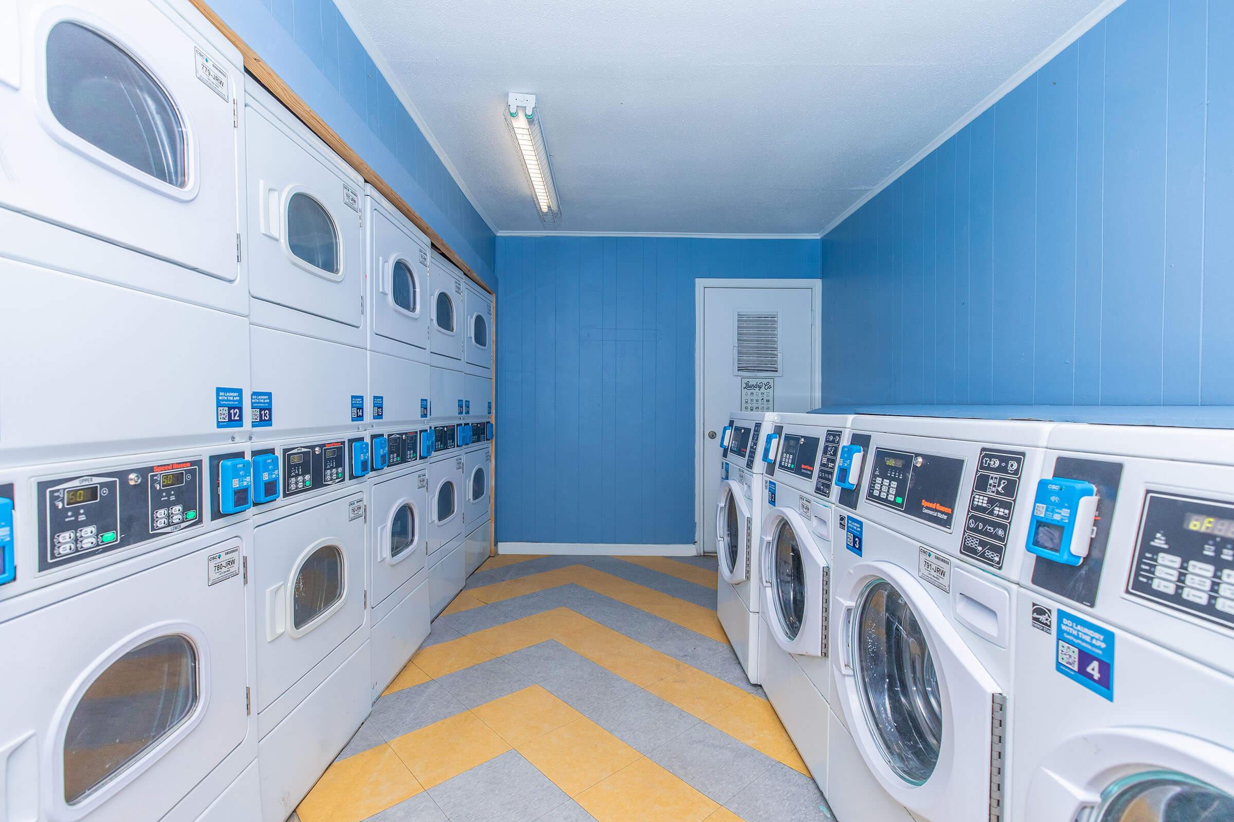 a kitchen with a blue background