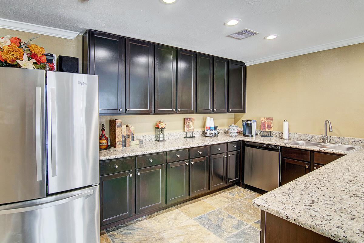 a modern kitchen with stainless steel appliances