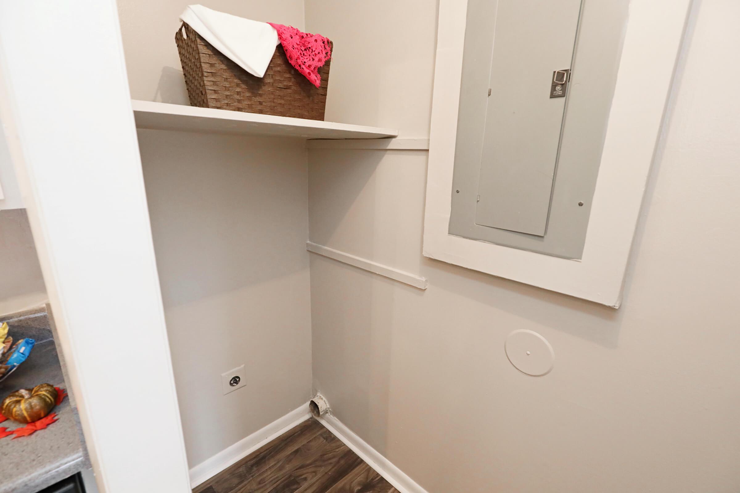 a white sink sitting next to a door