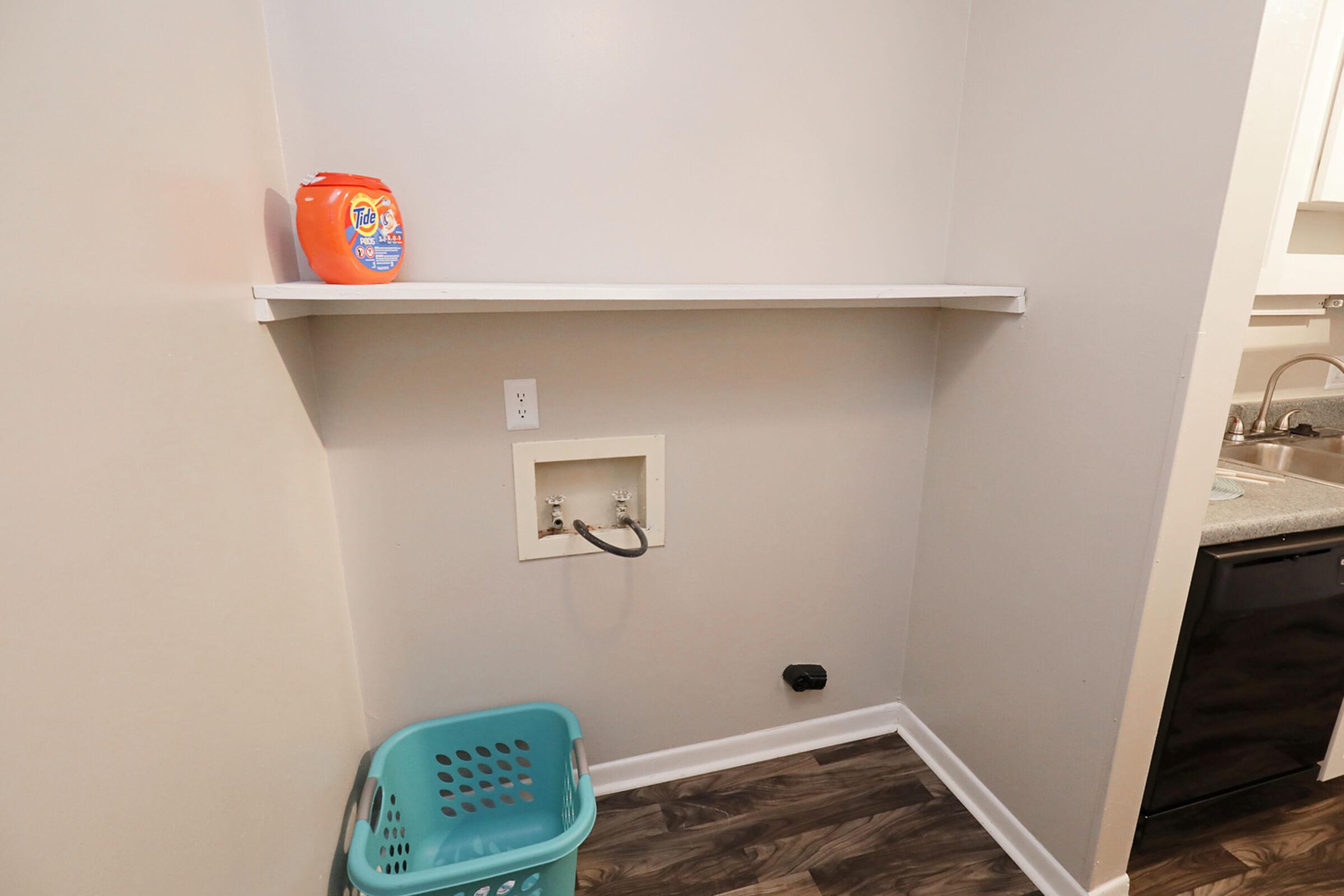 a close up of a sink in a small room