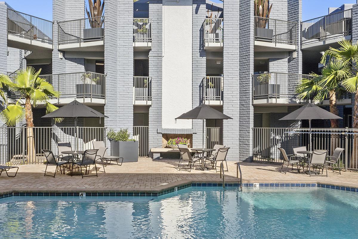 a large pool of water in front of a building