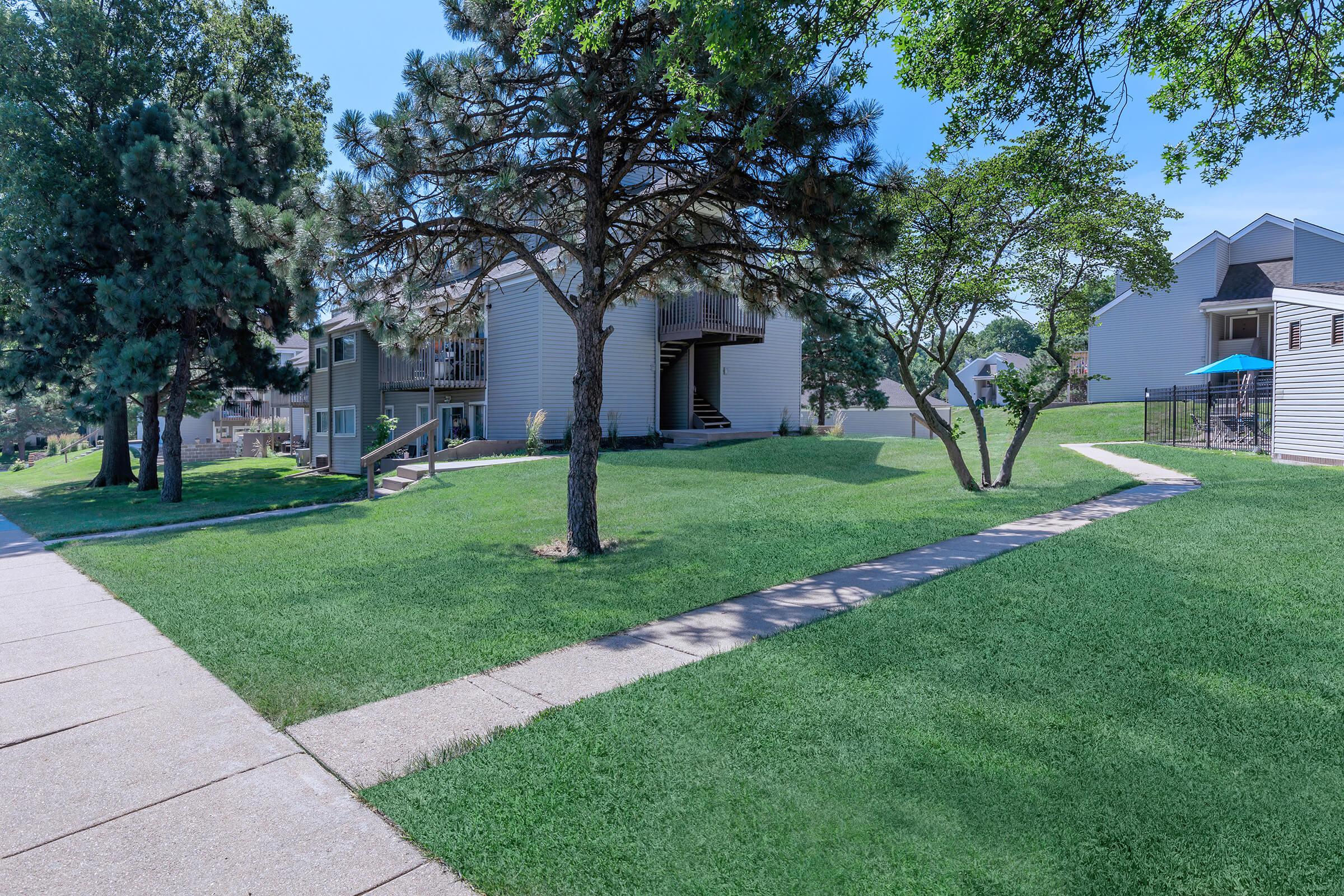 a large lawn in front of a house